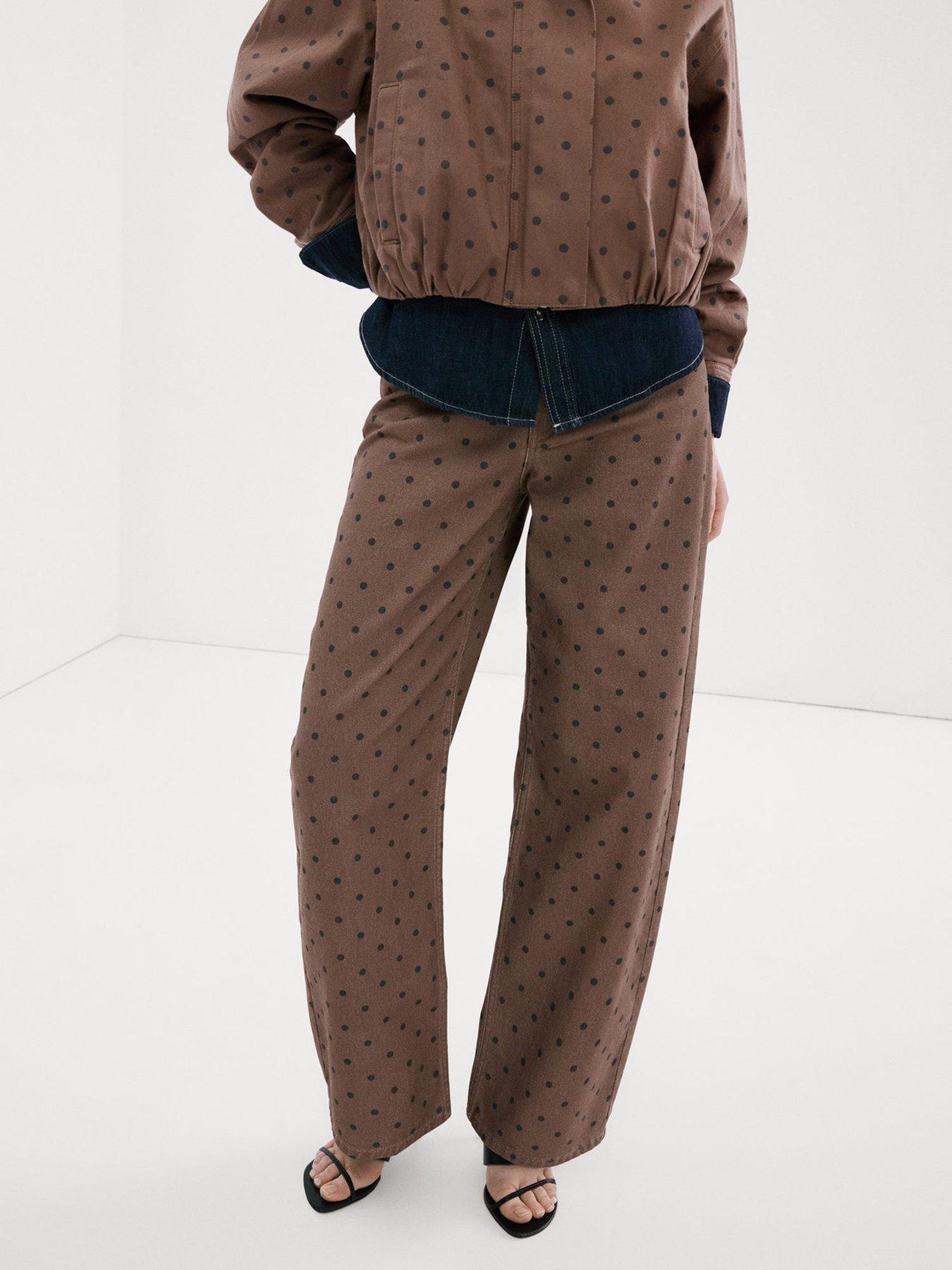 front image of mango-polka-dot-balloon-jeans-brown