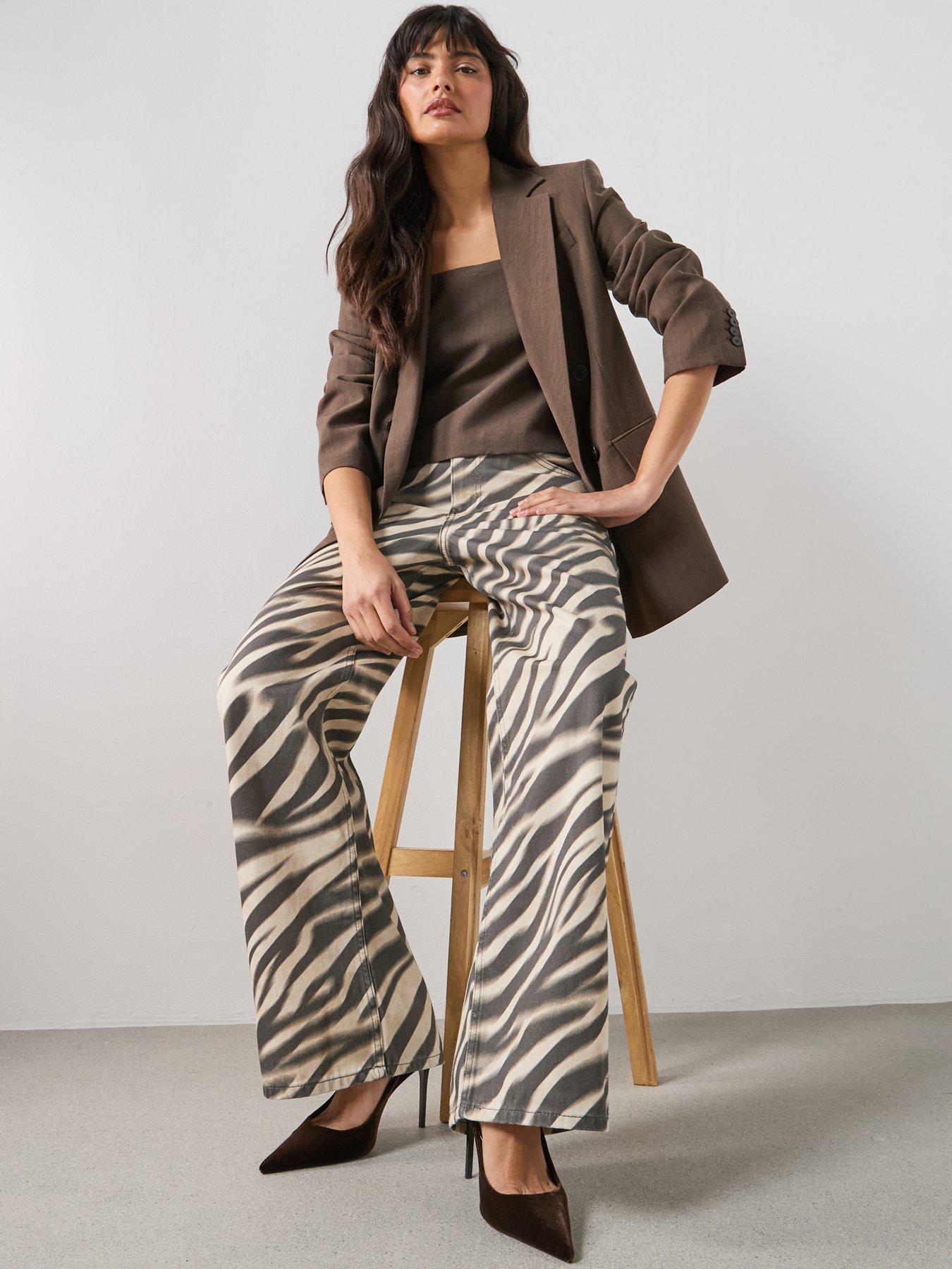  image of mango-zebra-print-straight-fit-jeans-cream