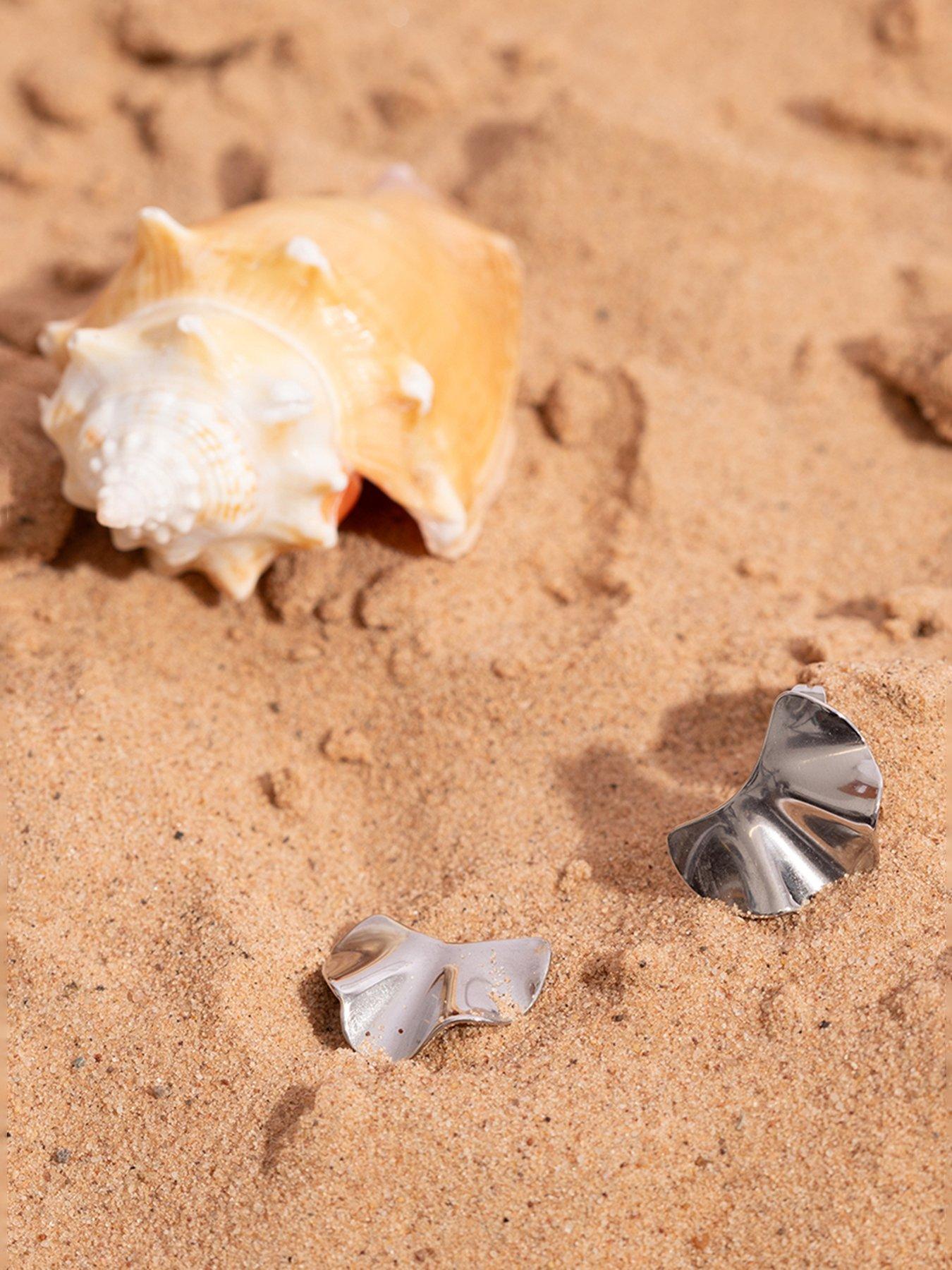 Image 4 of 5 of The Love Collection Stainless Steel Wave Stud Earrings