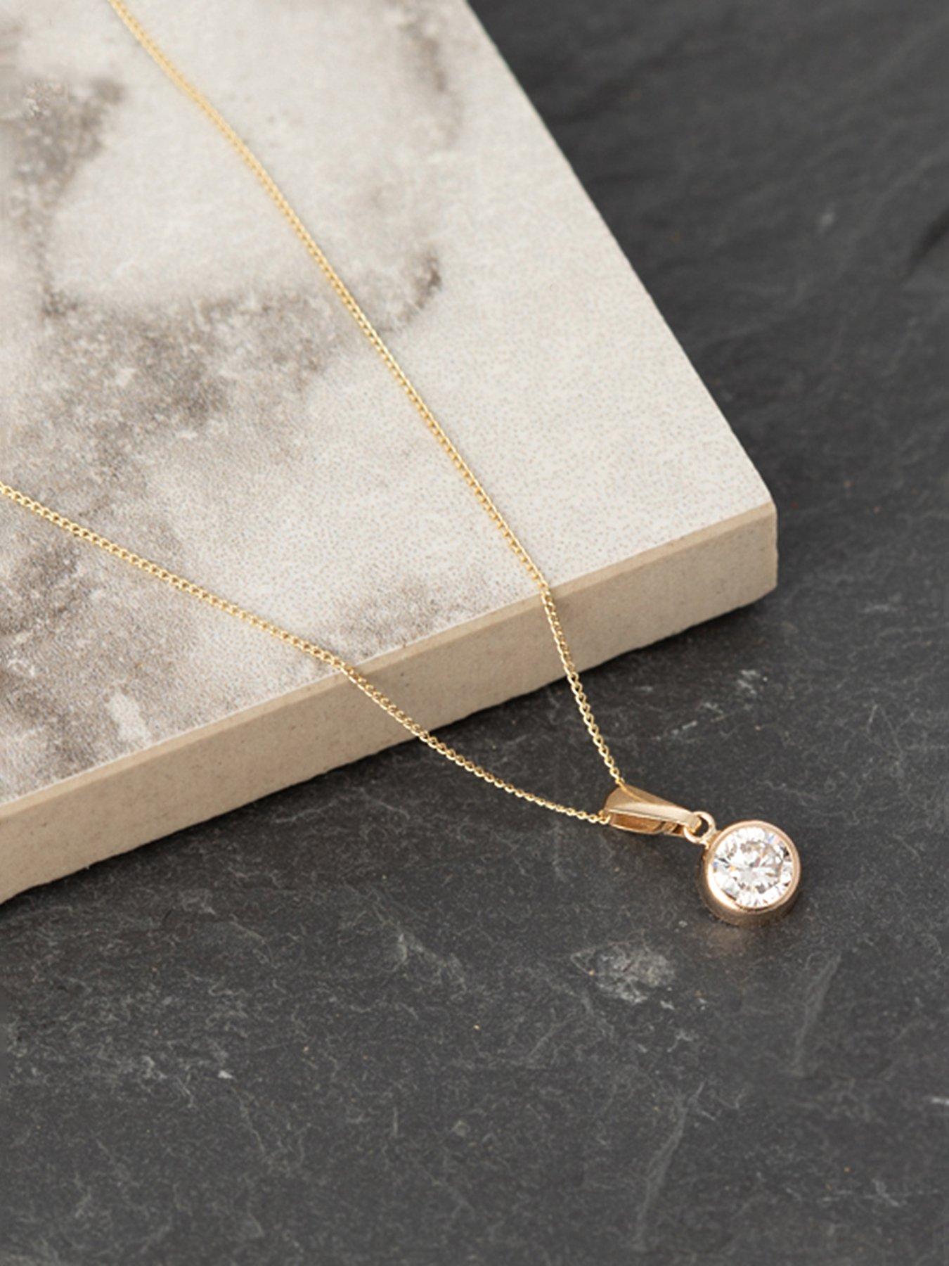  image of the-love-collection-9ct-yellow-gold-white-cz-rubover-pendant