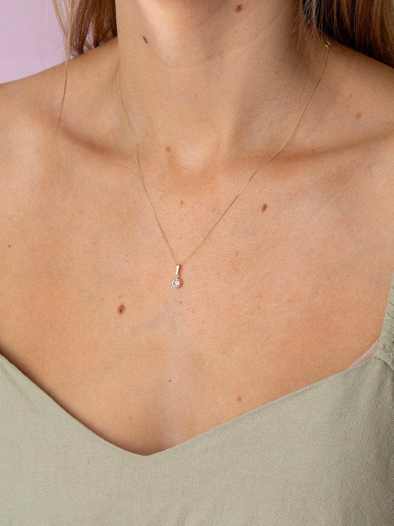  image of the-love-collection-9ct-yellow-gold-white-cz-rubover-pendant