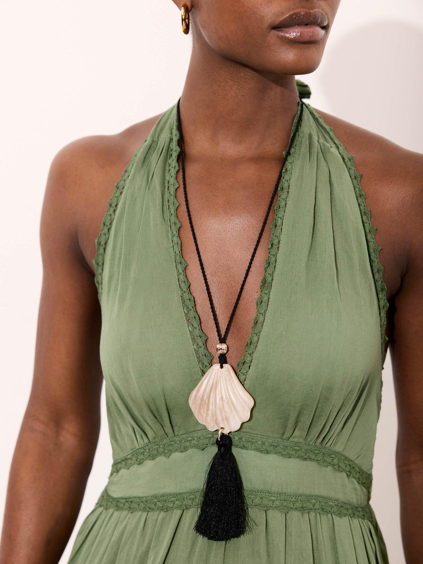  image of mint-velvet-shell-resin-tassel-pendant