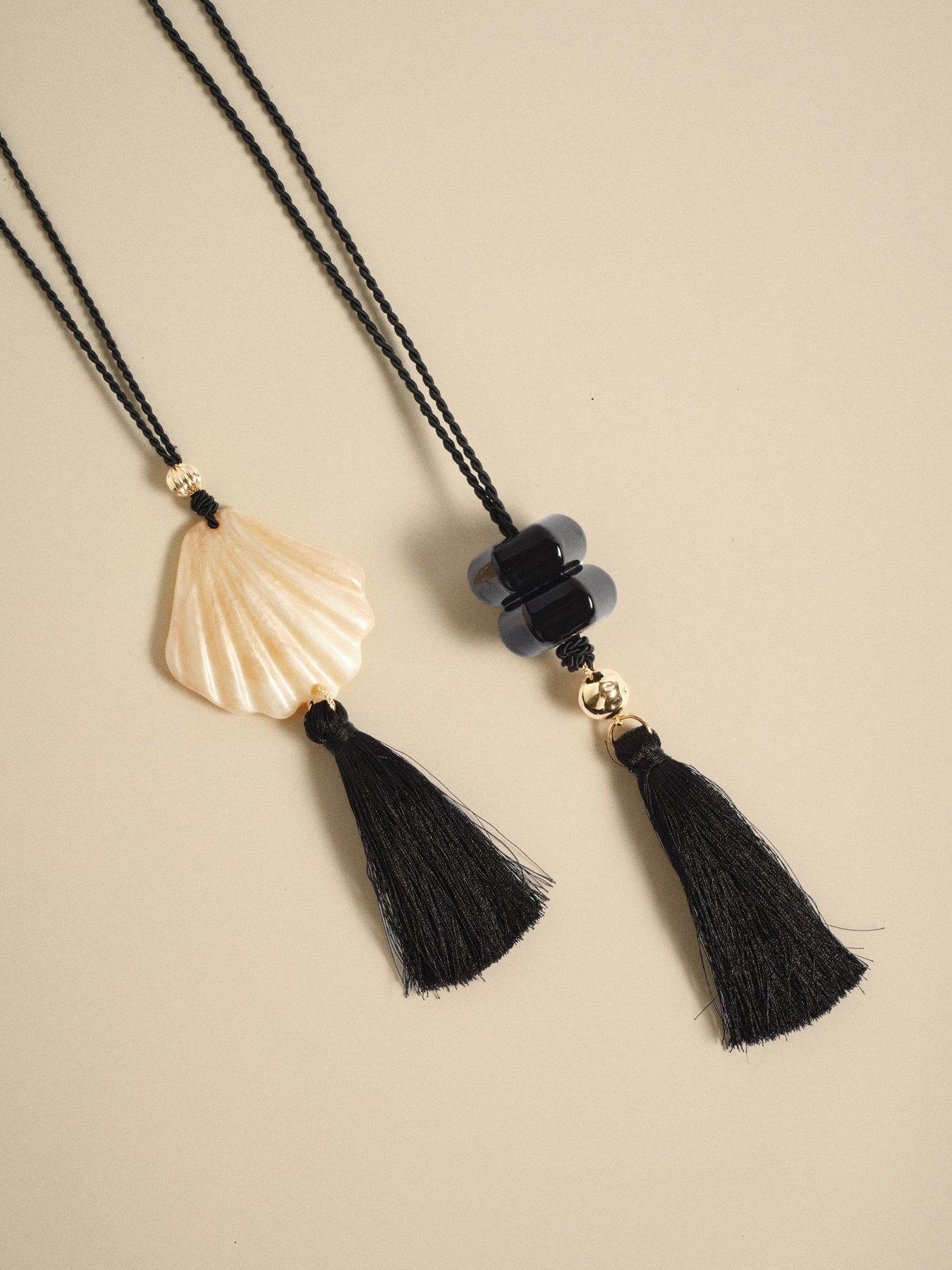 image of mint-velvet-shell-resin-tassel-pendant