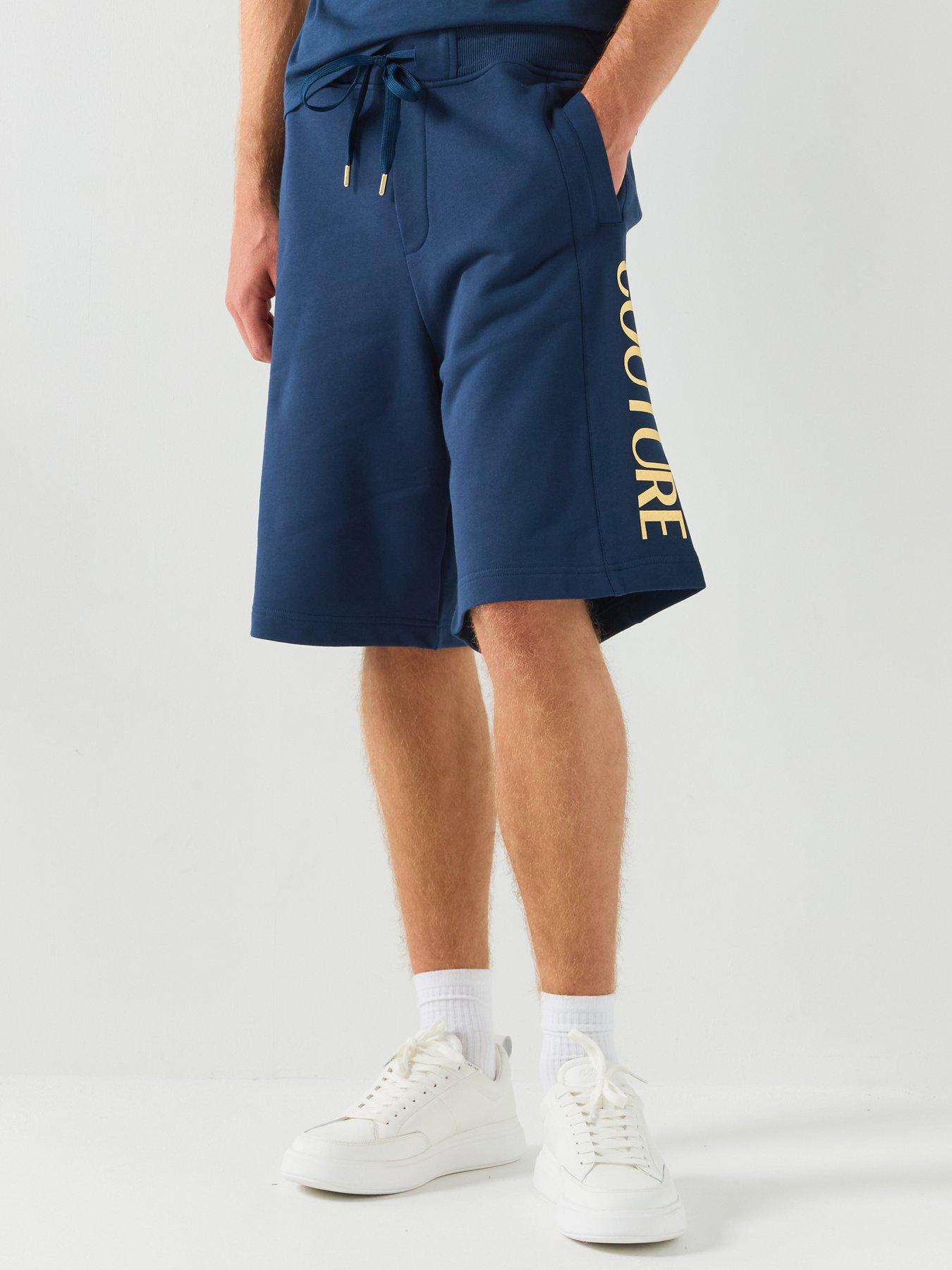 Image 1 of 6 of Versace Jeans Couture Foil Logo Jersey Regular Fit Shorts - Blue