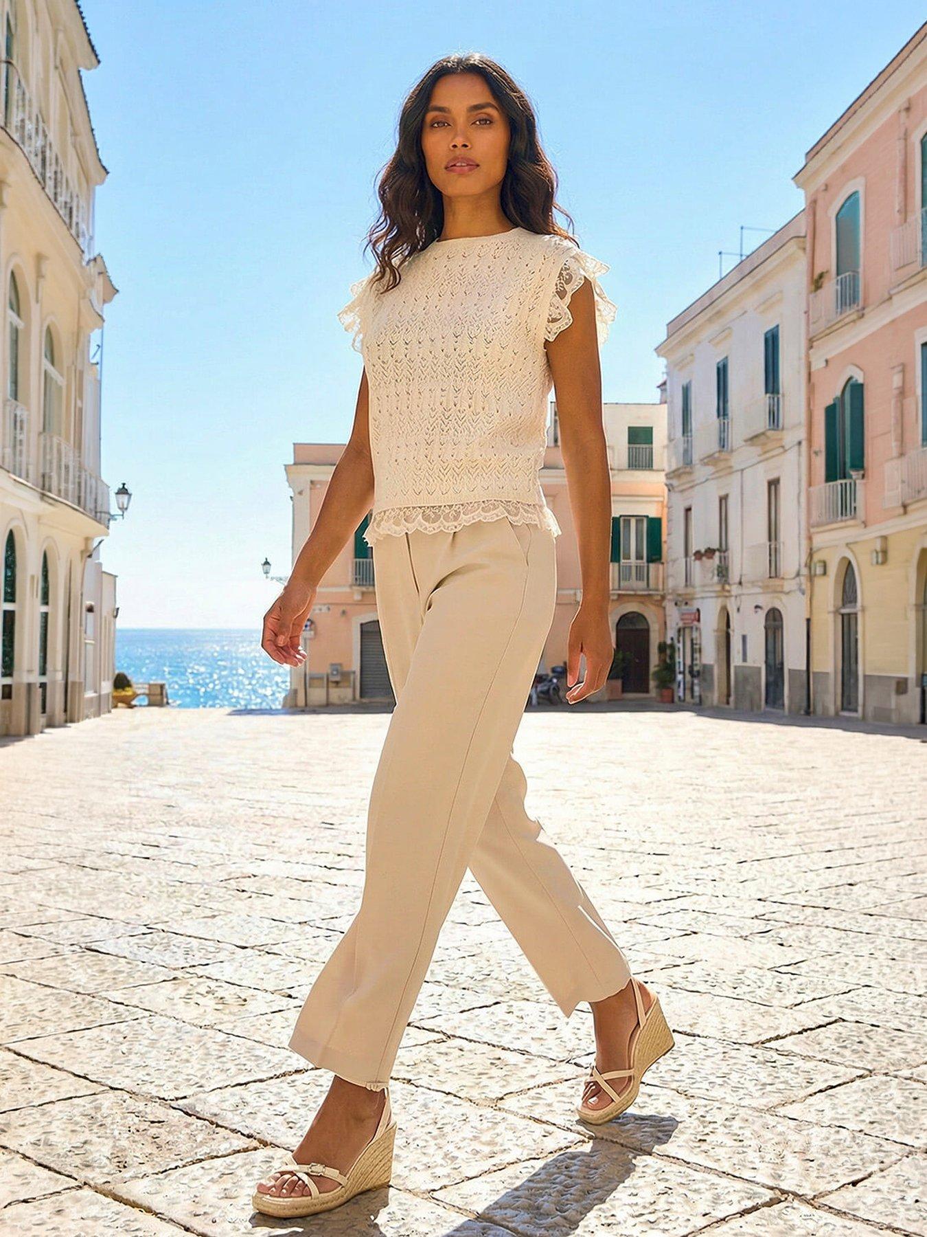  image of roman-frill-lace-knitted-top