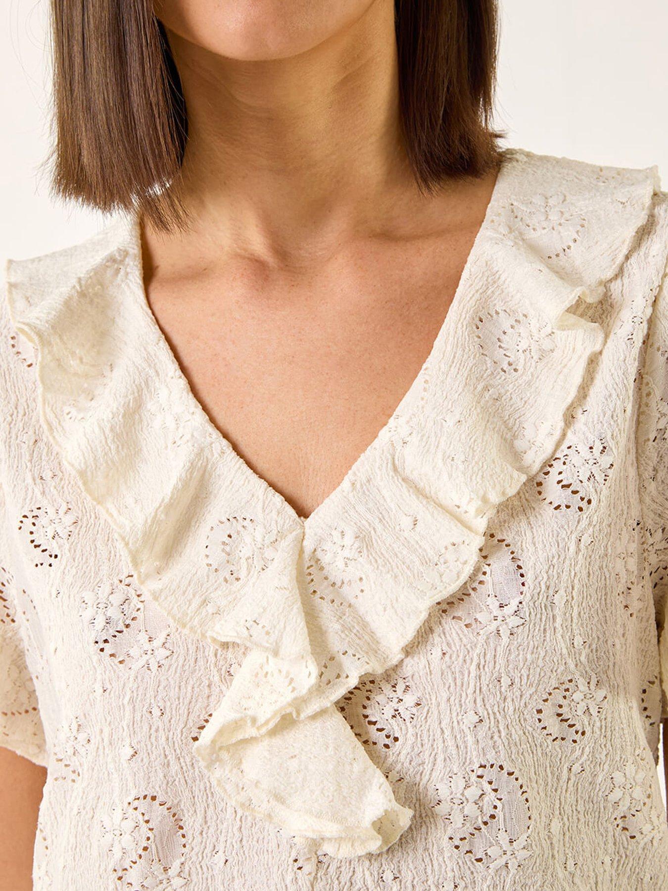  image of roman-textured-frill-top