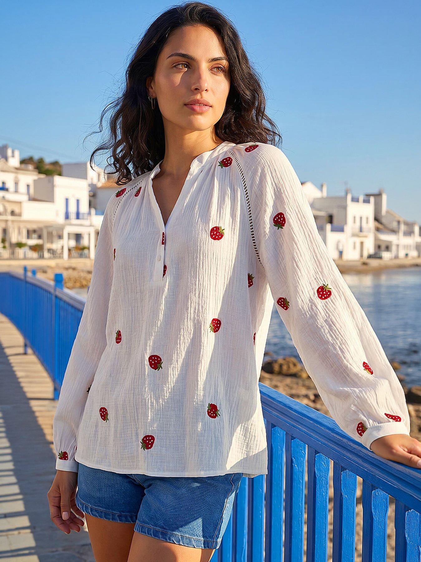 front image of roman-dusk-strawberry-v-neck-tunic-top