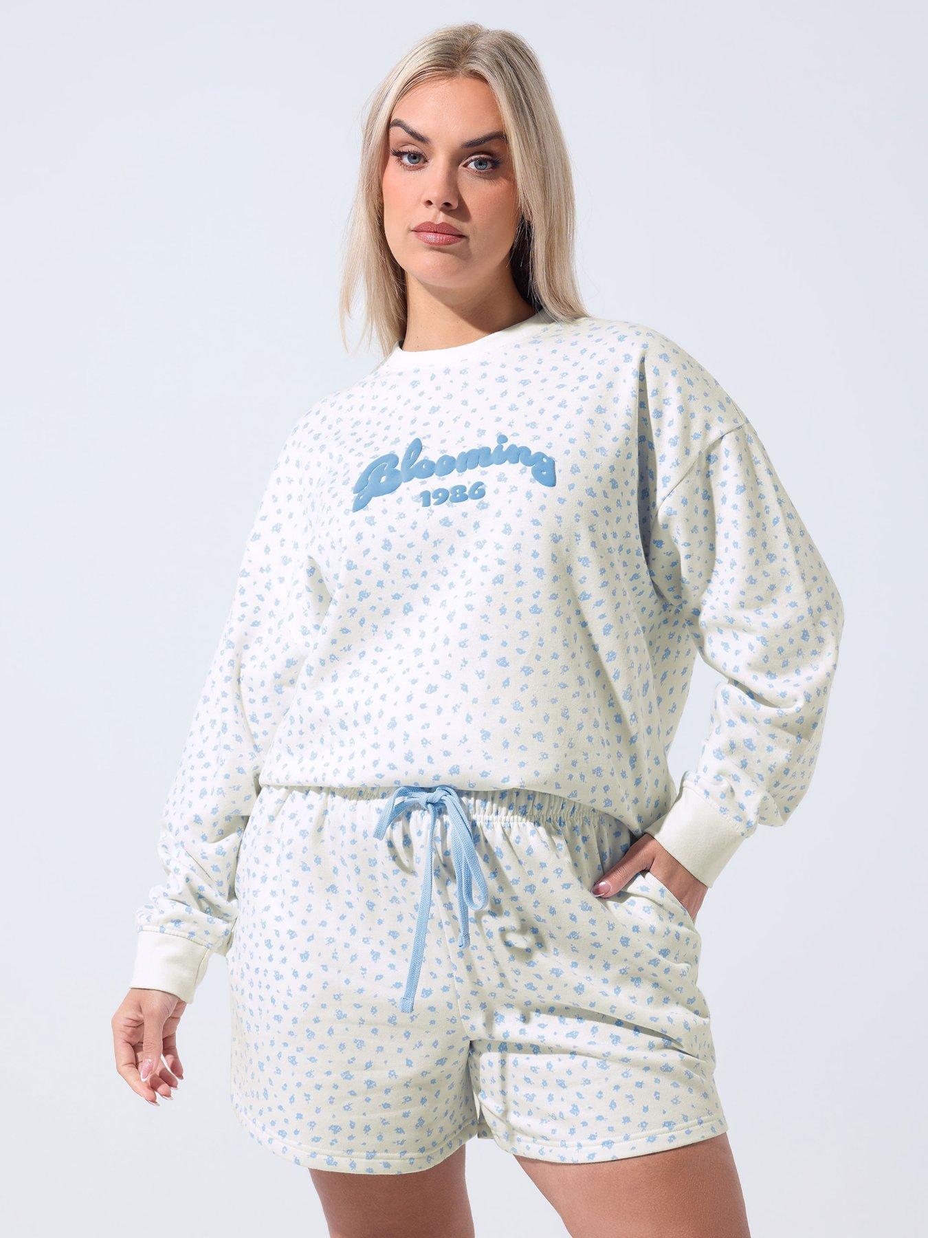front image of yours-curve-ditsy-printed-shorts-white