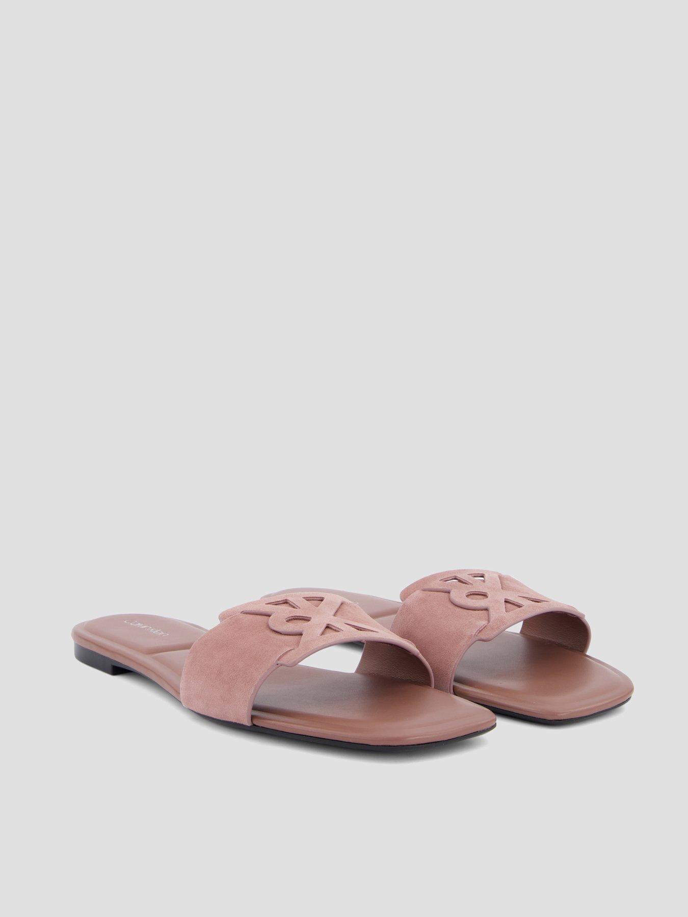Image 6 of 7 of Calvin Klein Suede Emblem Flat Sandals - Brown