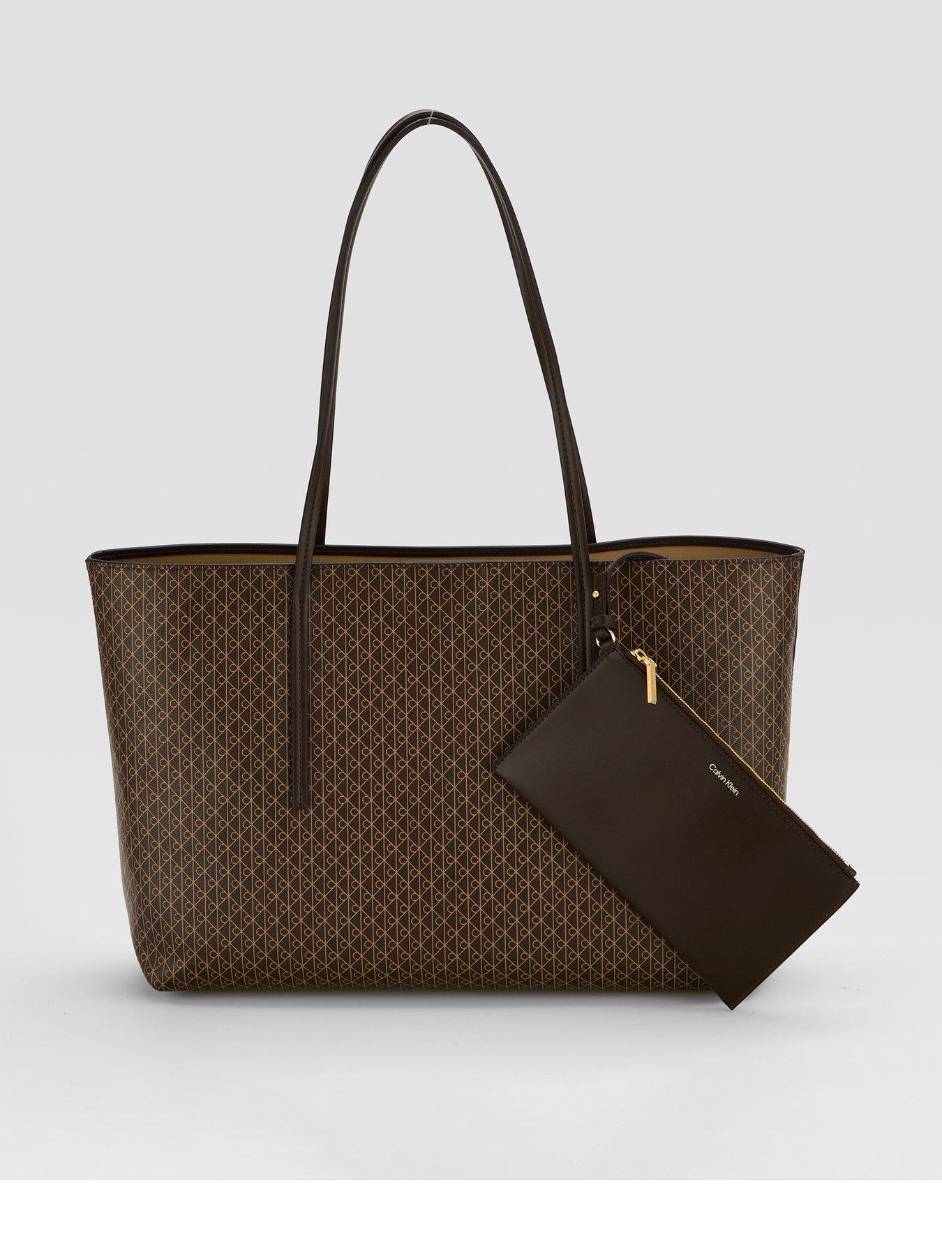 Image 1 of 6 of Calvin Klein Emblem Print Tote Bag With Pouch - Brown