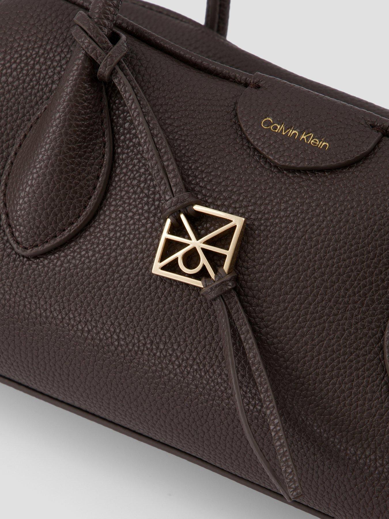 Image 3 of 4 of Calvin Klein Emblem Pebble Grain Extended Side Shoulder Bag - Brown