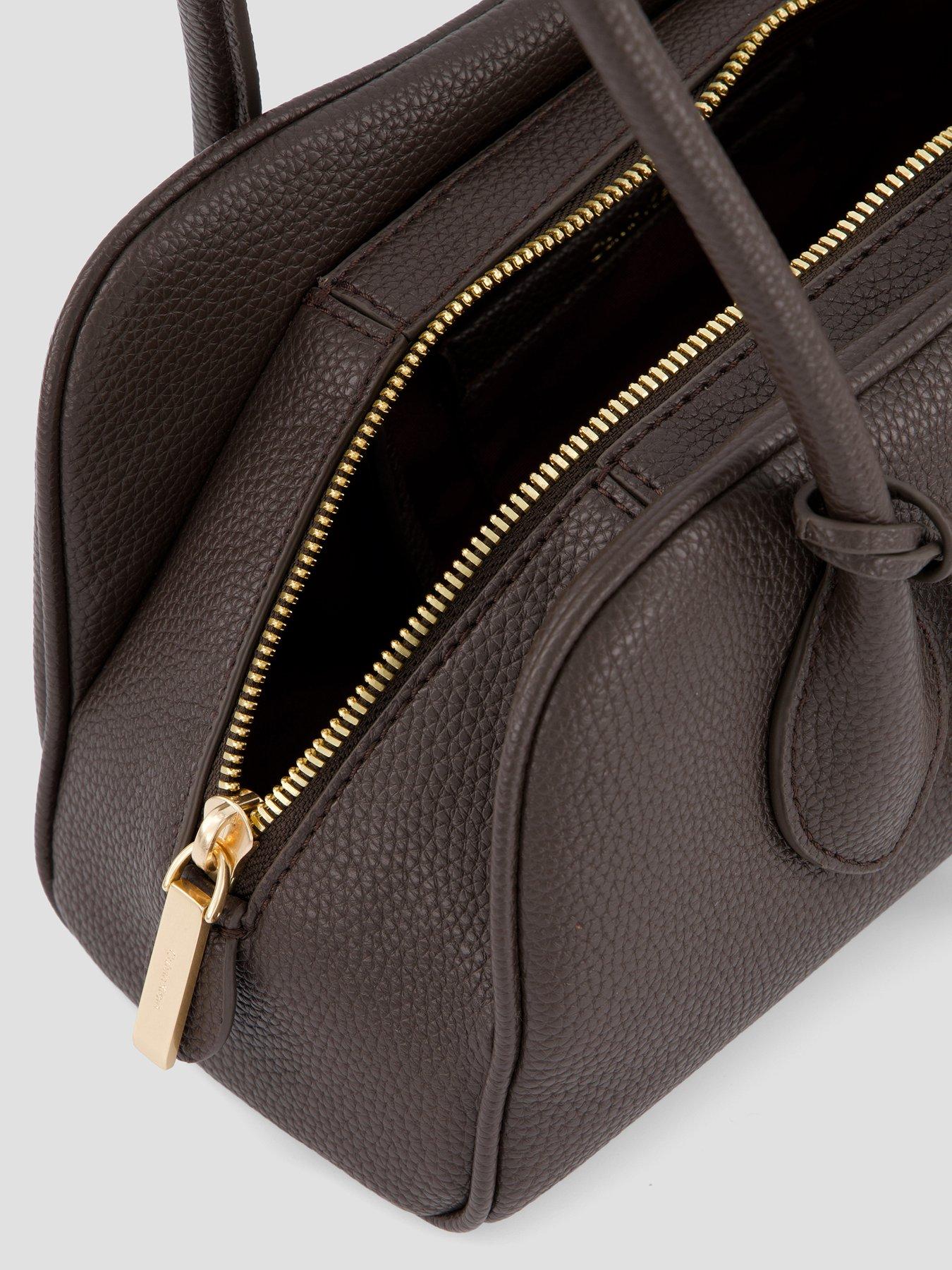Image 4 of 4 of Calvin Klein Emblem Pebble Grain Extended Side Shoulder Bag - Brown