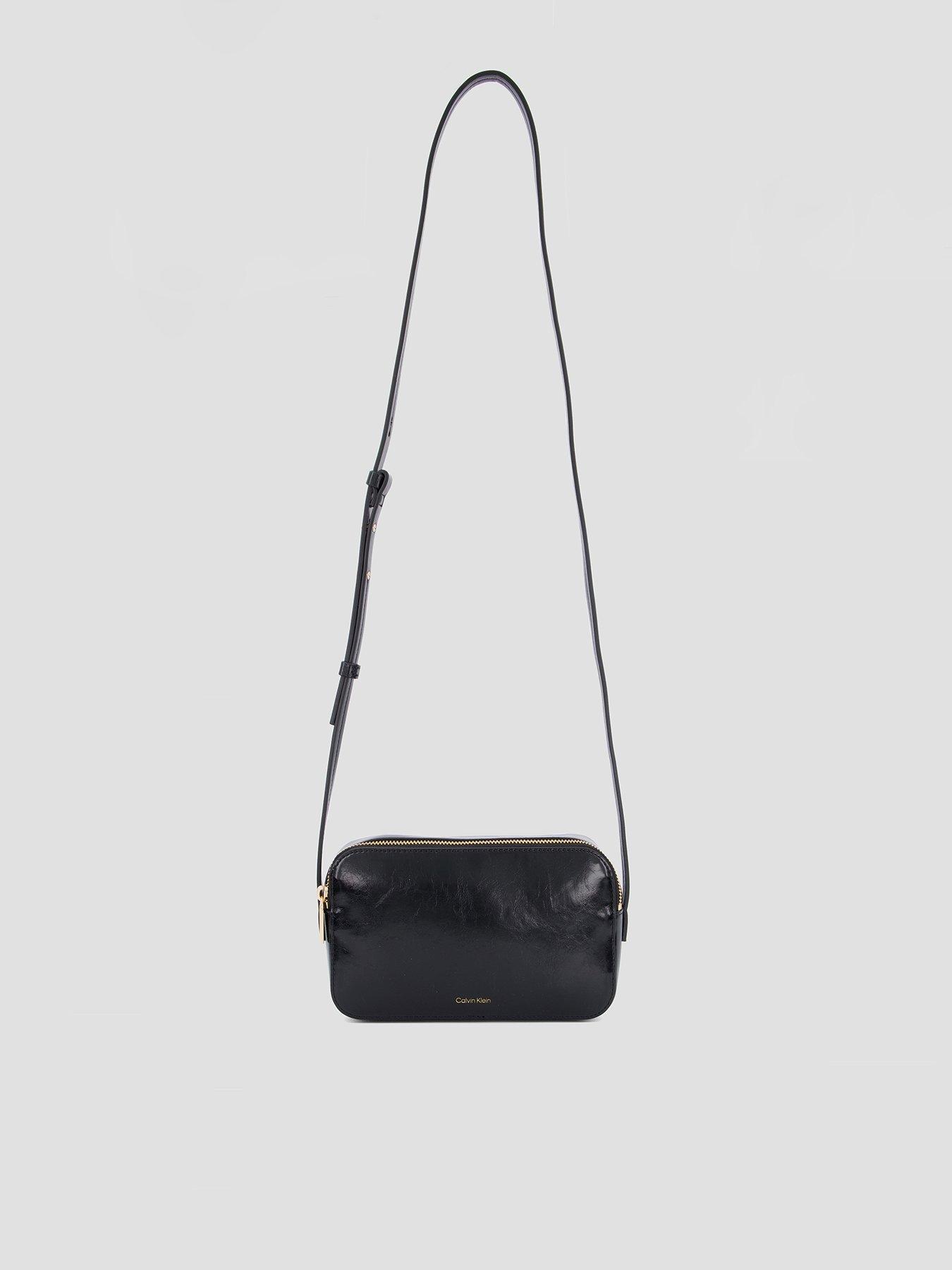 Image 1 of 6 of Calvin Klein Foil Logo Glossy Crossbody Camera Bag - Black