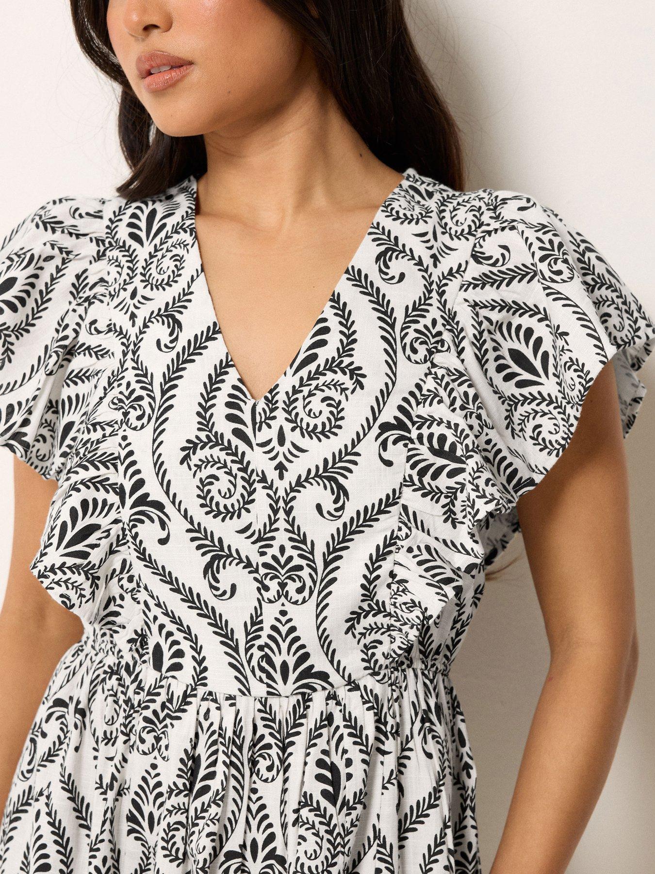 Image 4 of 5 of PixieGirl Petite Frill Print Maxi Dress - White