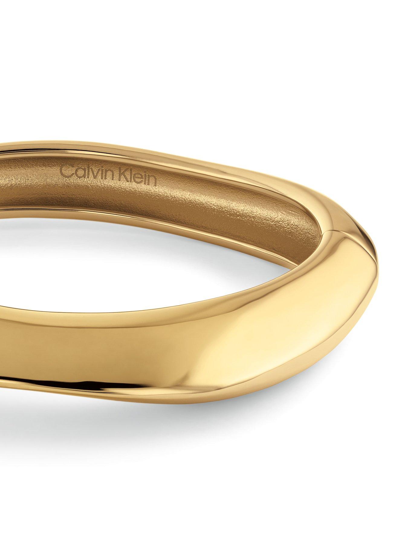  image of calvin-klein-womens-ck-sculpted-gold-plated-bangle