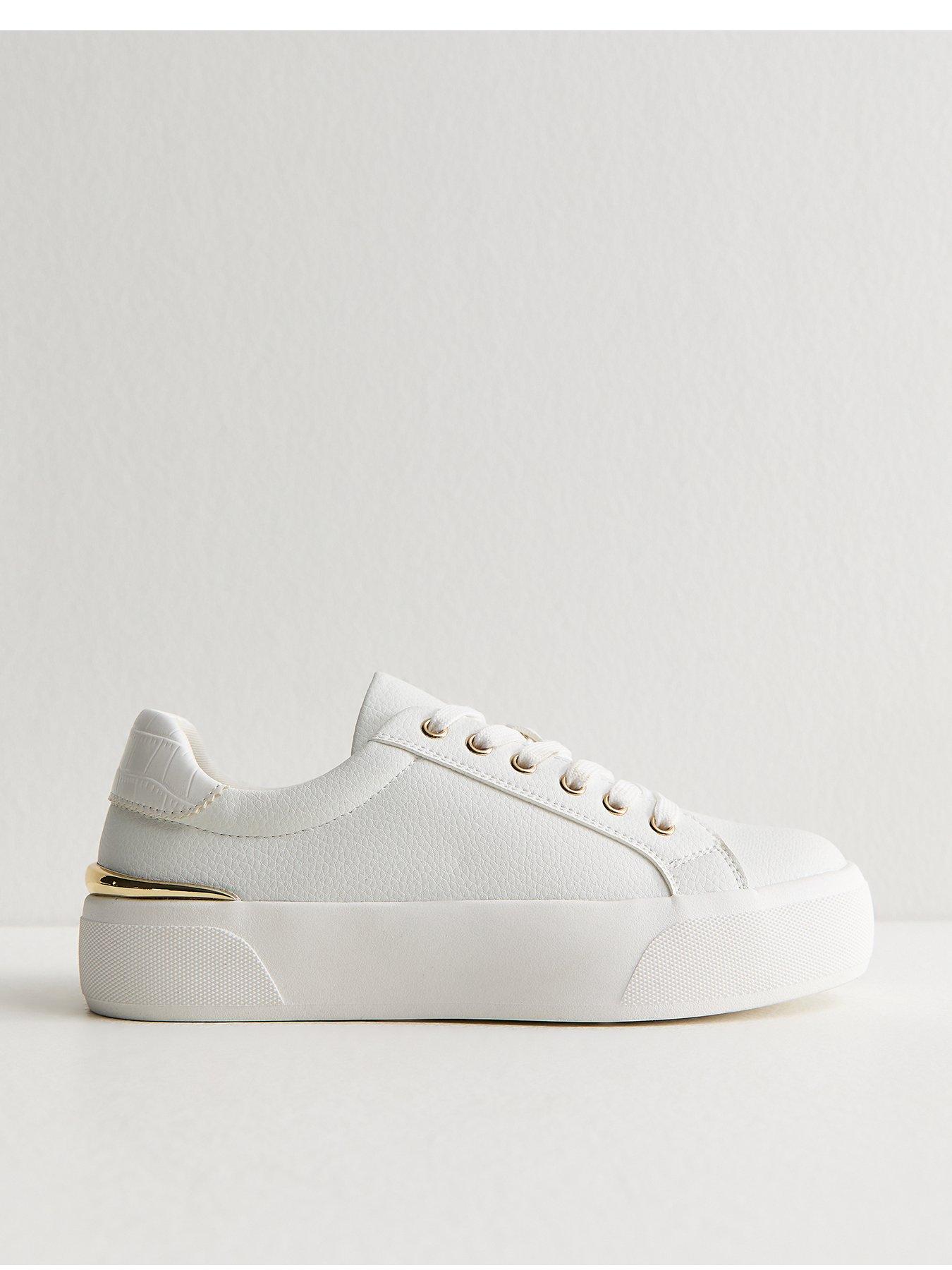 Image 1 of 6 of New Look White and Gold Platform Trainers