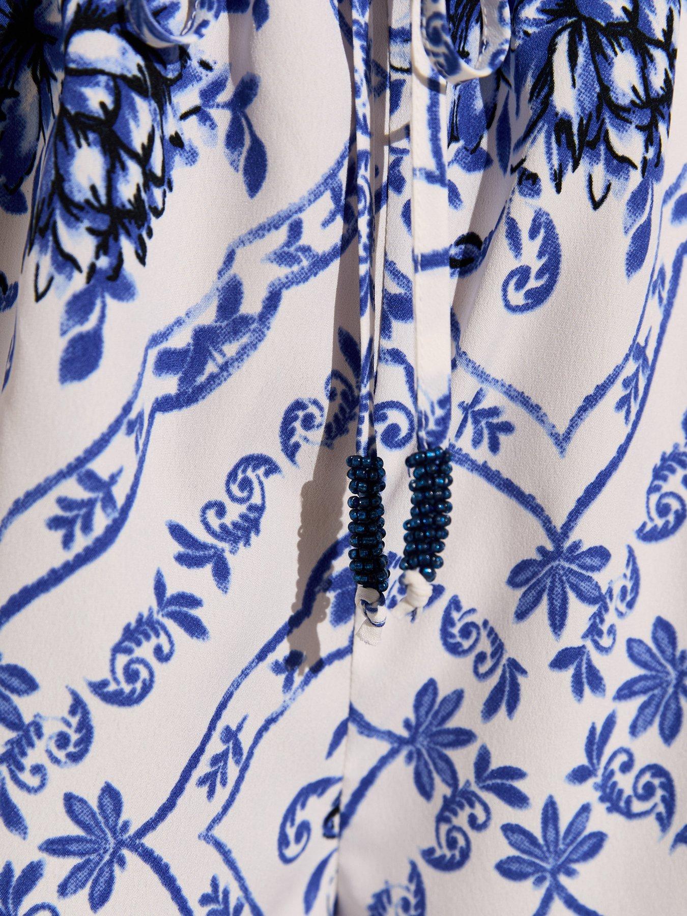 Image 6 of 6 of New Look Blue Tile Pattern Crepe Beach Playsuit - White