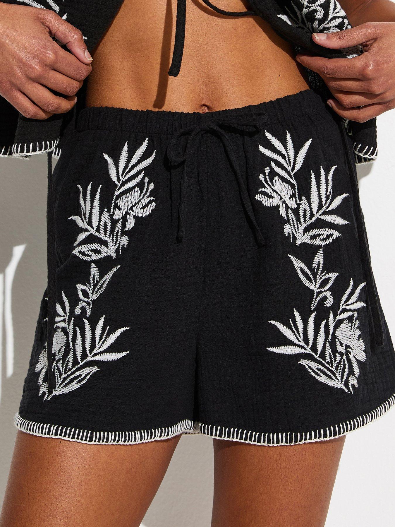Image 1 of 5 of New Look Cotton Embroidered Floral Co-ord Beach Shorts - Black