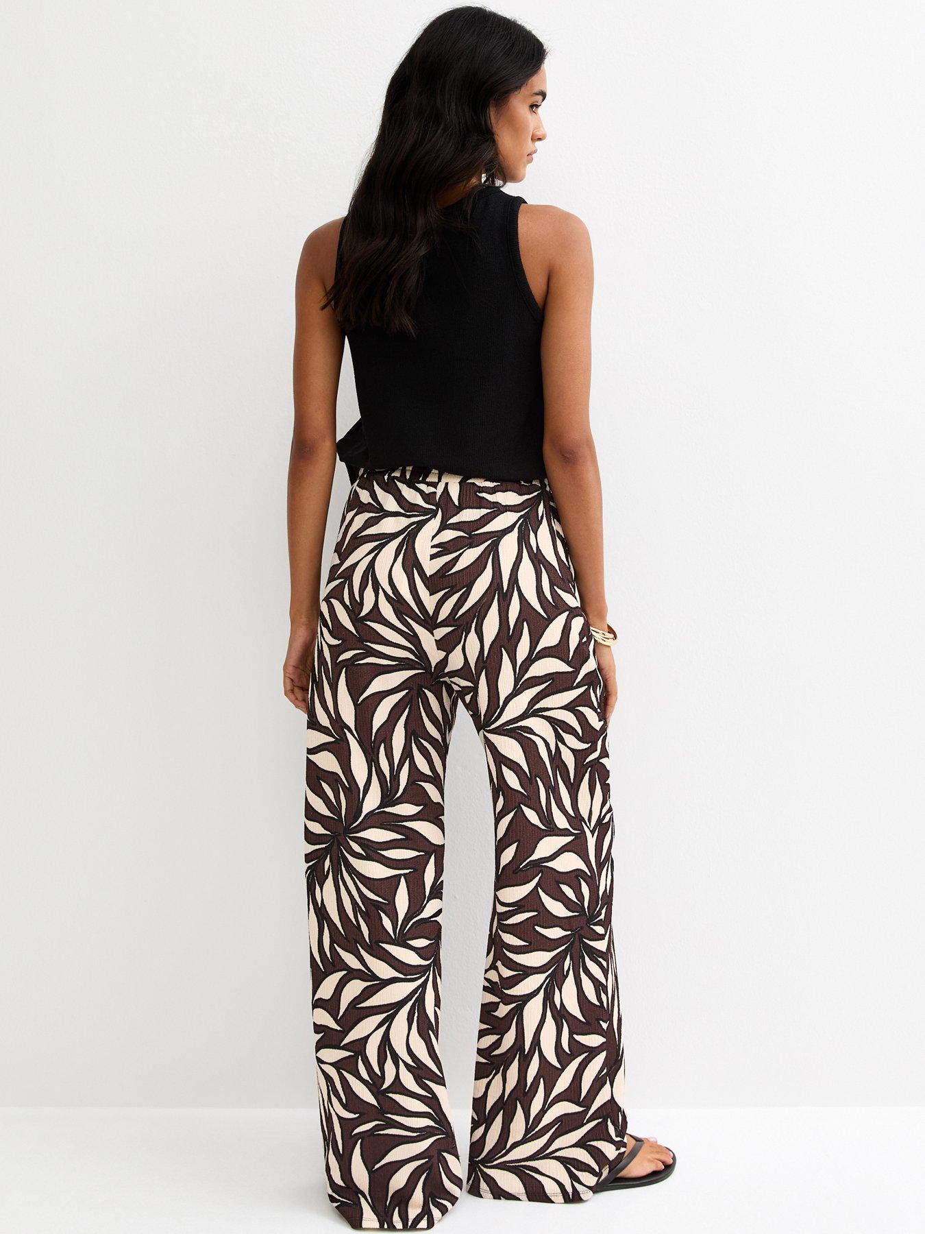 Image 2 of 5 of New Look Brown Leaf Print Crinkle Texture Wide Leg Trousers