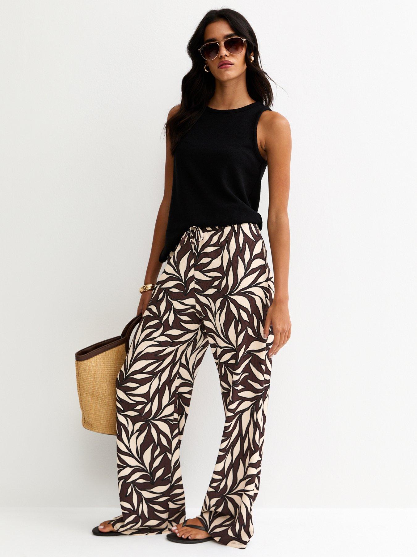 Image 3 of 5 of New Look Brown Leaf Print Crinkle Texture Wide Leg Trousers