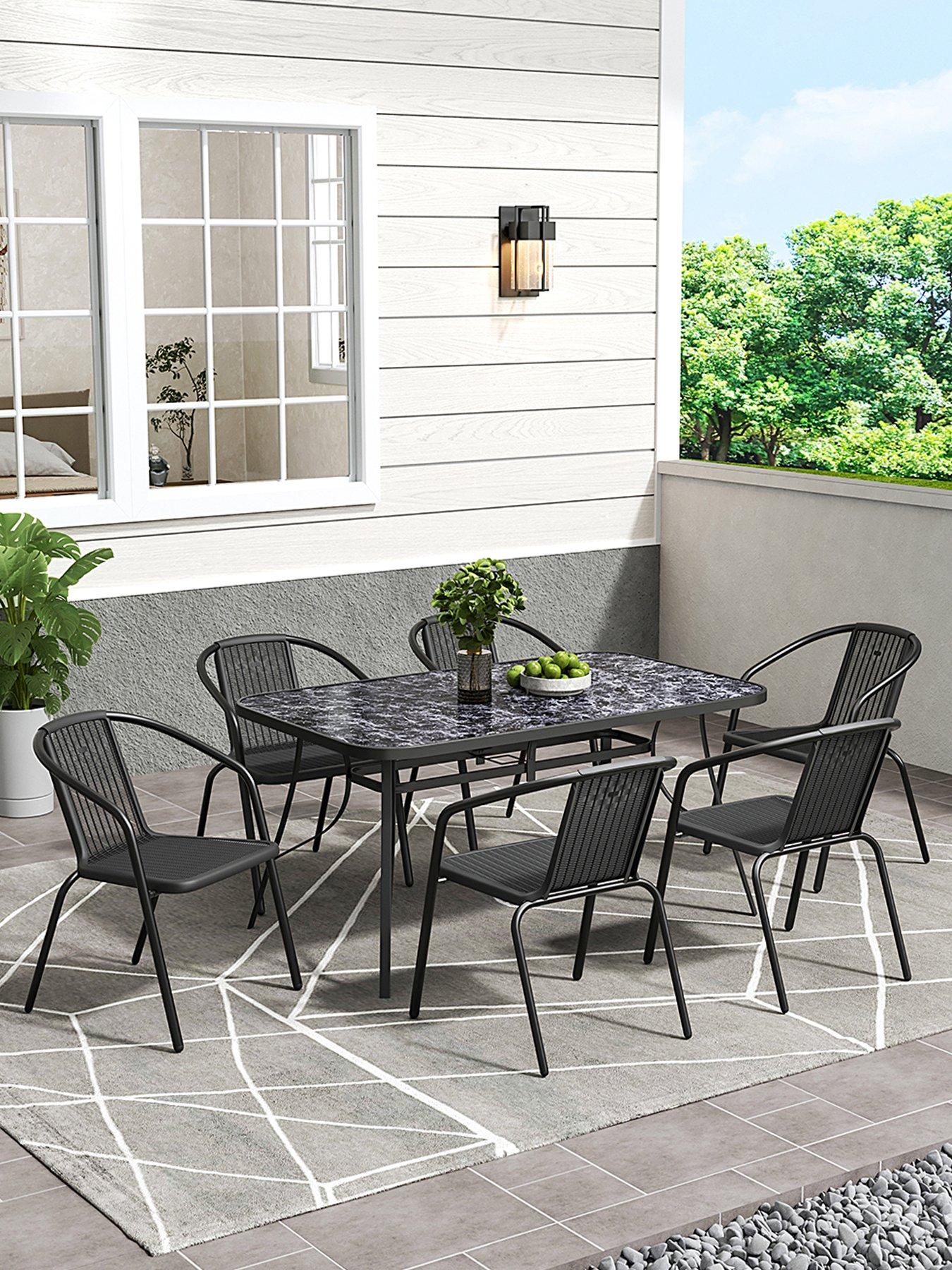  image of living-and-home-garden-marble-pattern-table-with-6-rattan-stackable-chairs