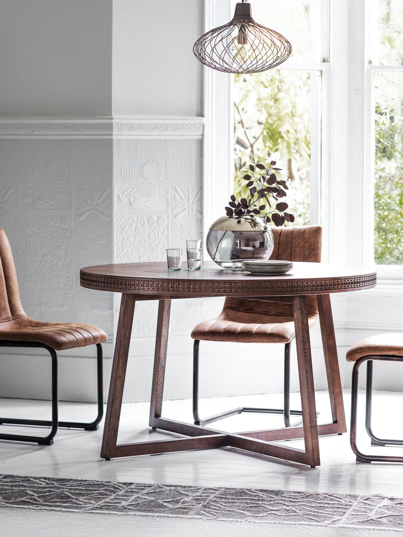  image of gallery-direct-boho-retreat-round-dining-table