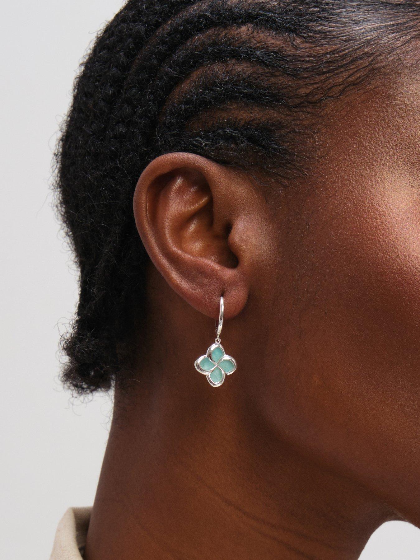  image of inicio-turquoise-clover-huggie-hoops