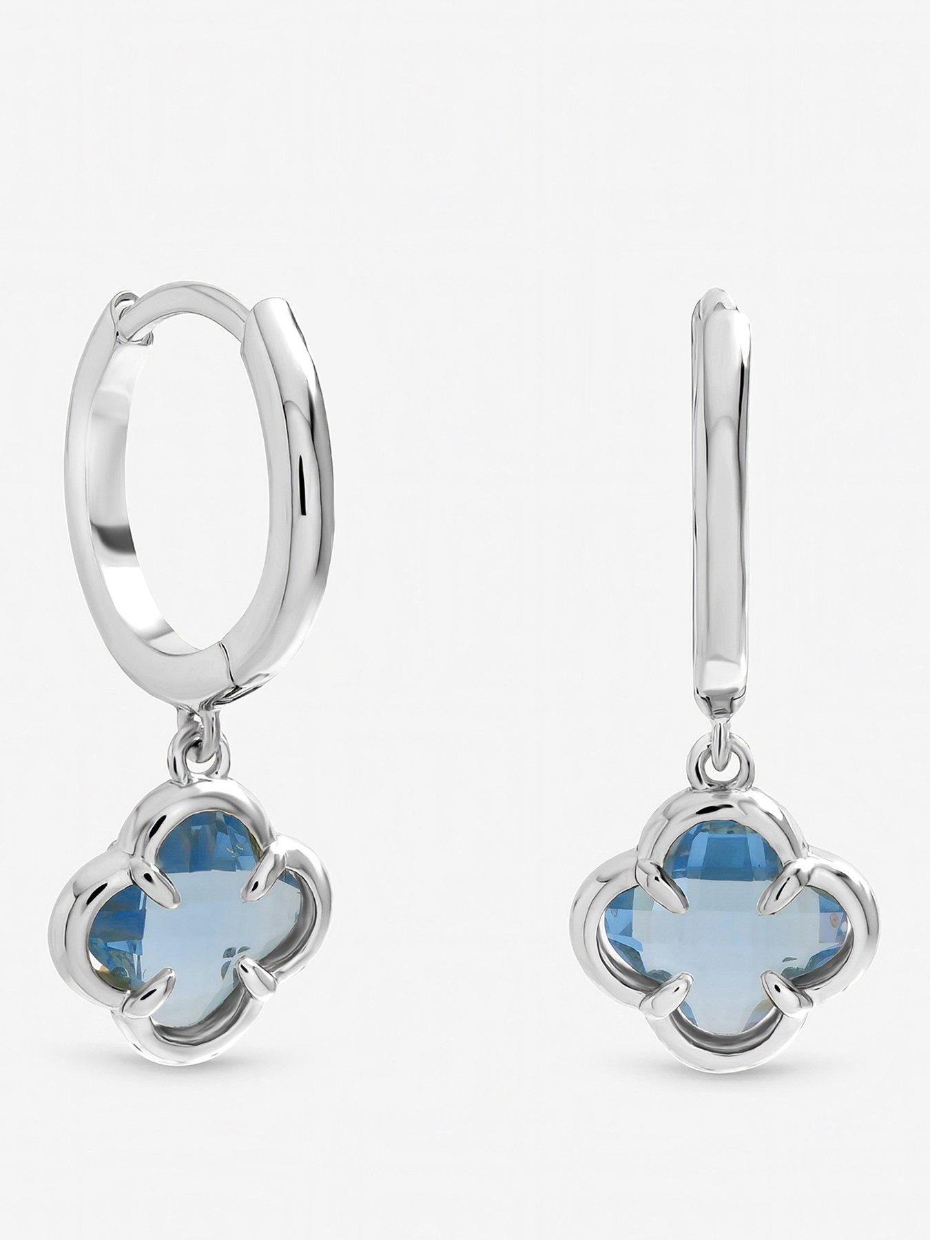 front image of inicio-light-sapphire-clover-charm-huggie-hoops