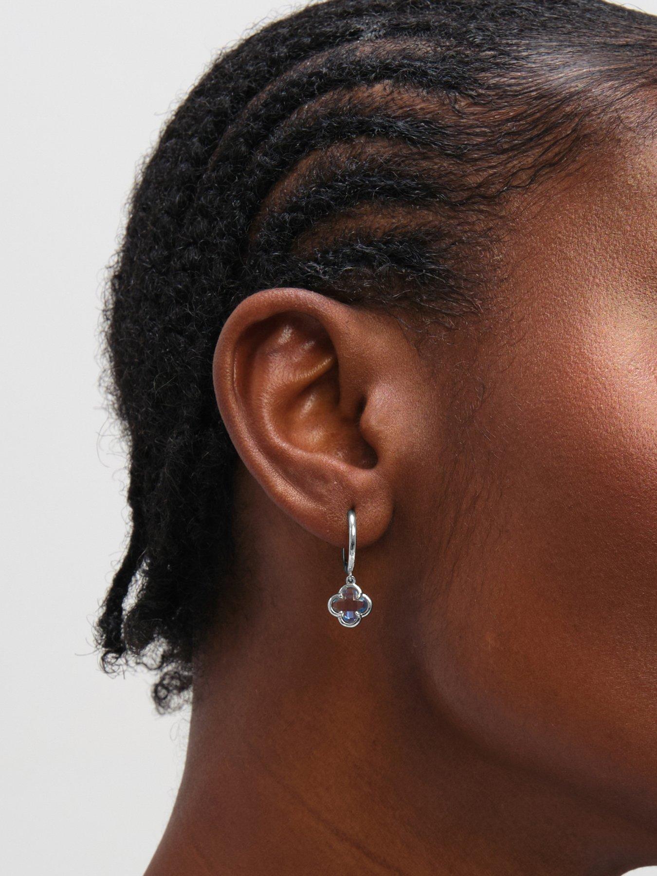 stillFront image of inicio-light-sapphire-clover-charm-huggie-hoops