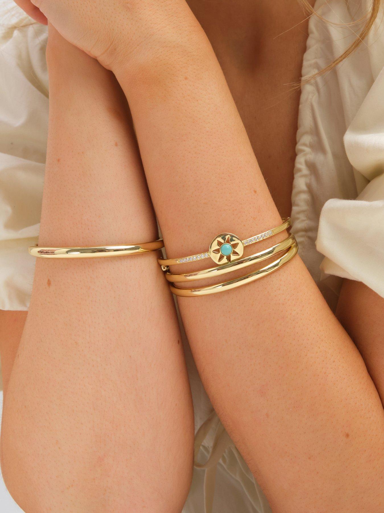 stillFront image of inicio-gold-plated-and-turquoise-celestial-bangle-gift-pouch