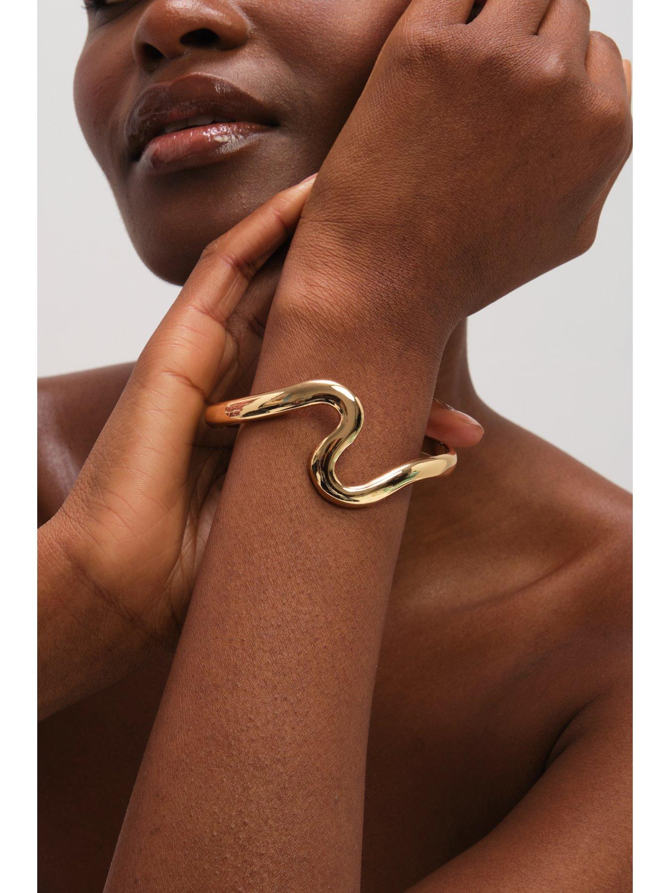  image of jon-richard-gold-plated-polished-swirl-bangle