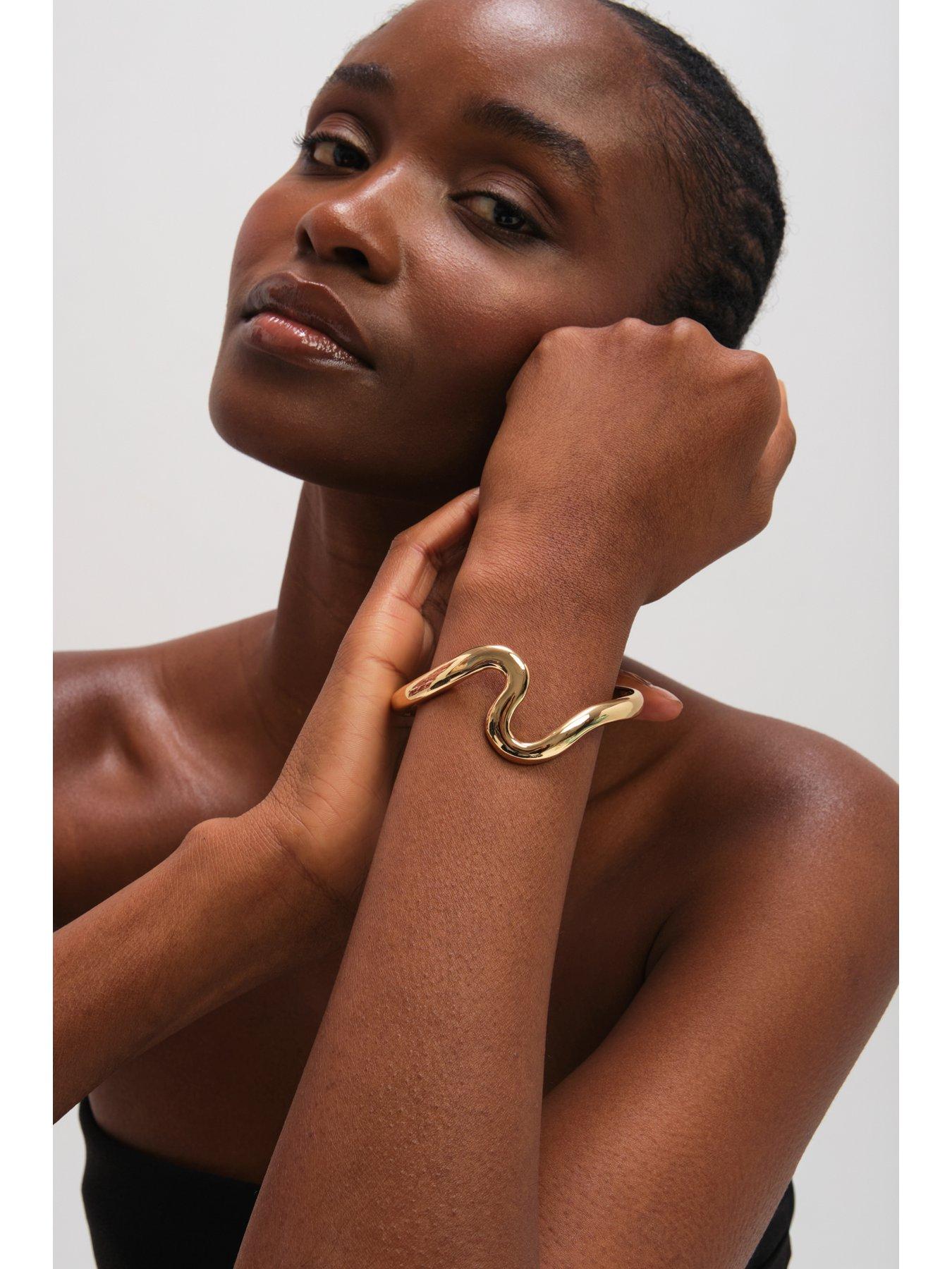  image of jon-richard-gold-plated-polished-swirl-bangle