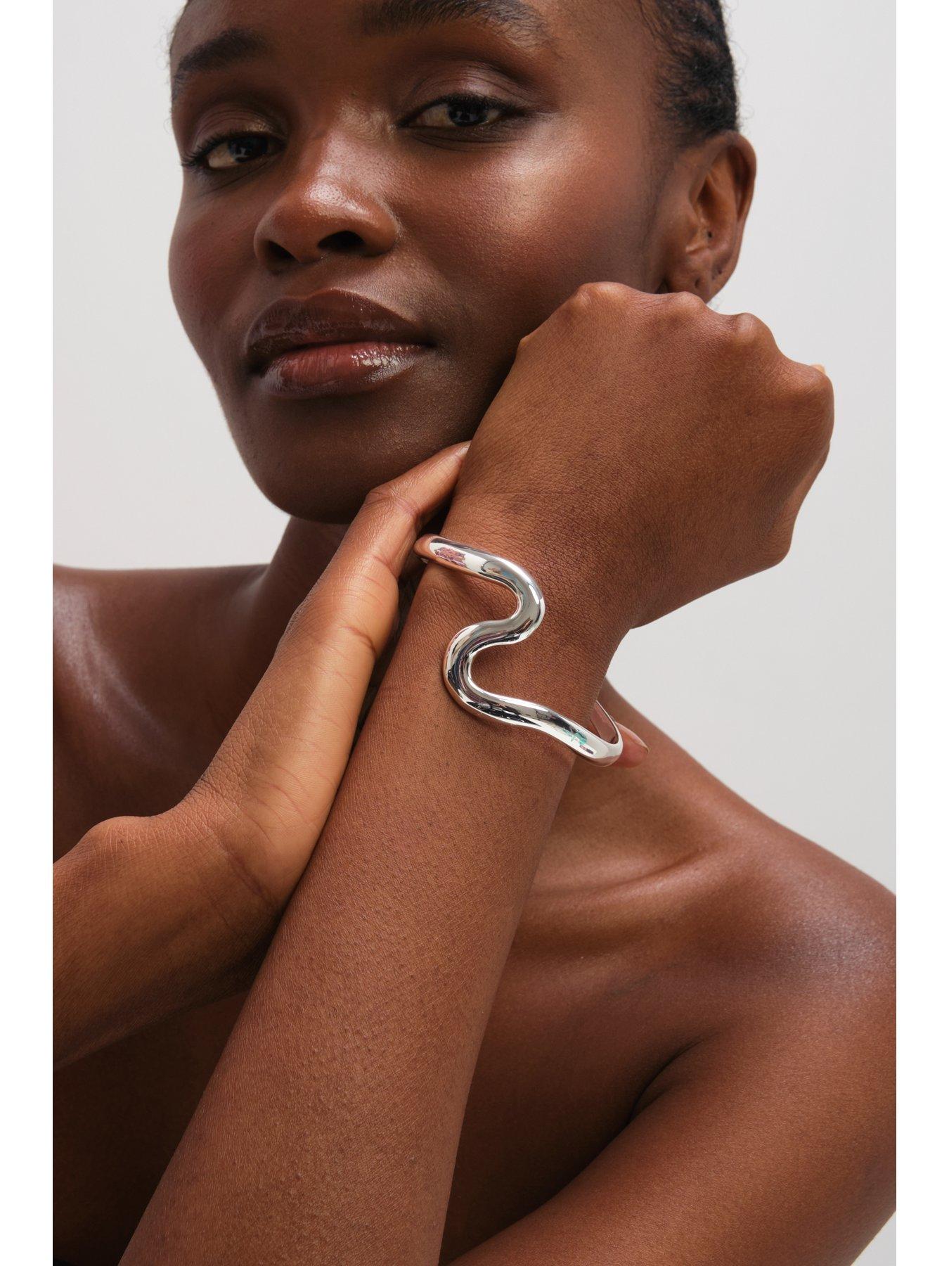  image of jon-richard-silver-plated-polished-swirl-bangle
