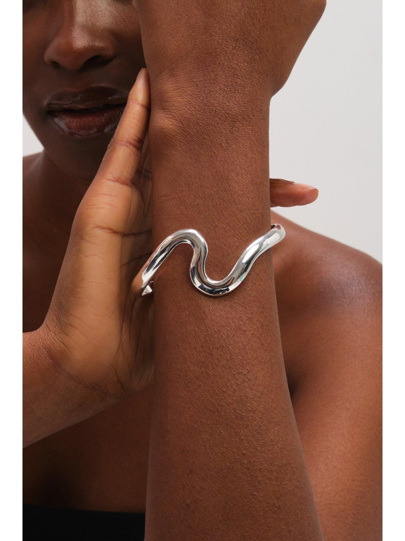  image of jon-richard-silver-plated-polished-swirl-bangle