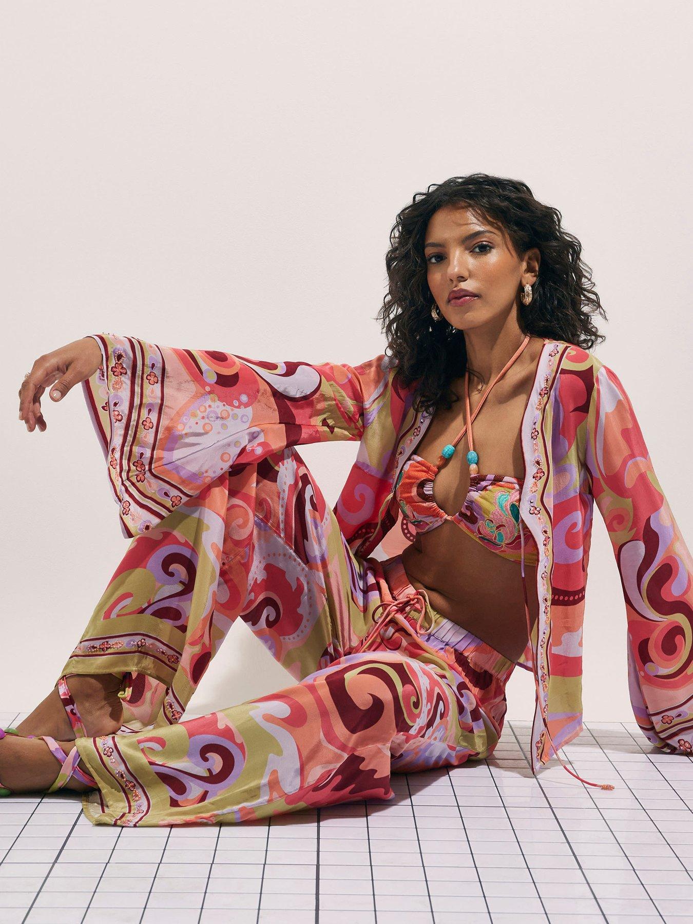 Image 4 of 4 of River Island Terry De Havilland Swirl Print Trouser - Orange