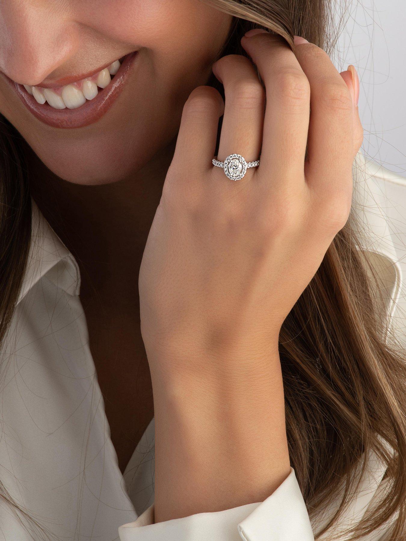 image of beaverbrooks-platinum-diamond-oval-cut-halo-ring