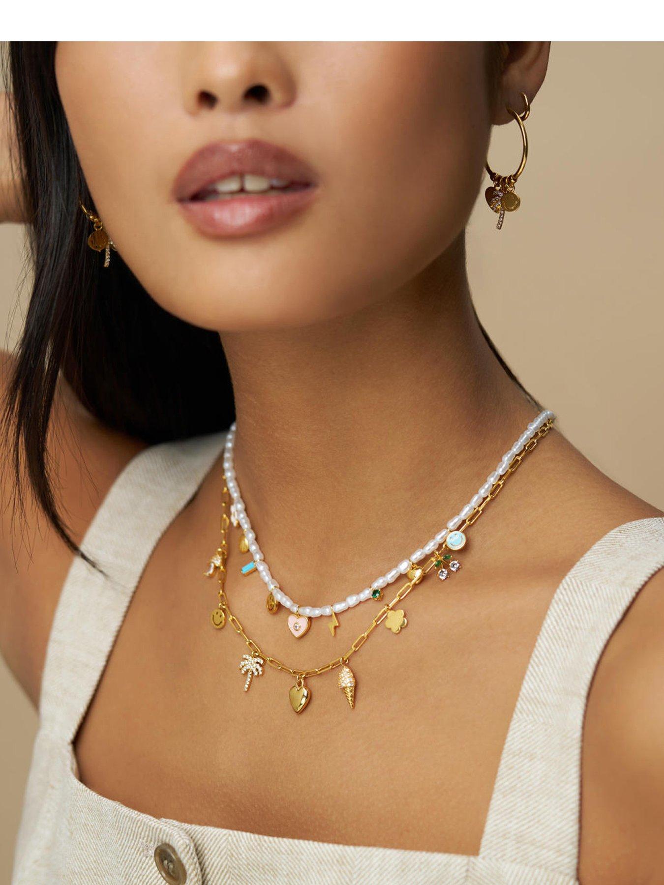 front image of orelia-mixed-eclectic-pave-charm-necklace
