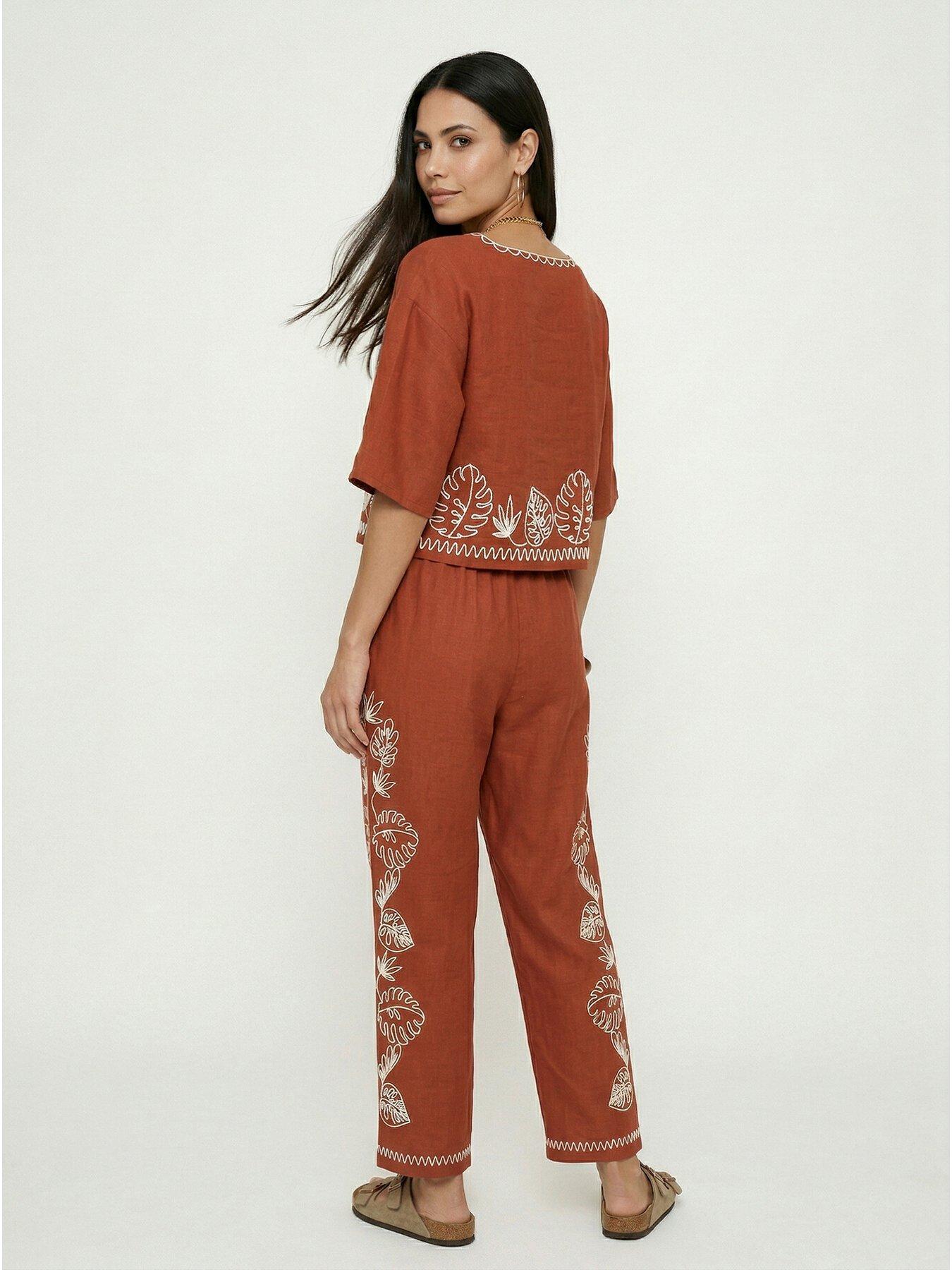 Image 2 of 7 of Raffya Tilly V-neck Embroidered Crop Top In Rust