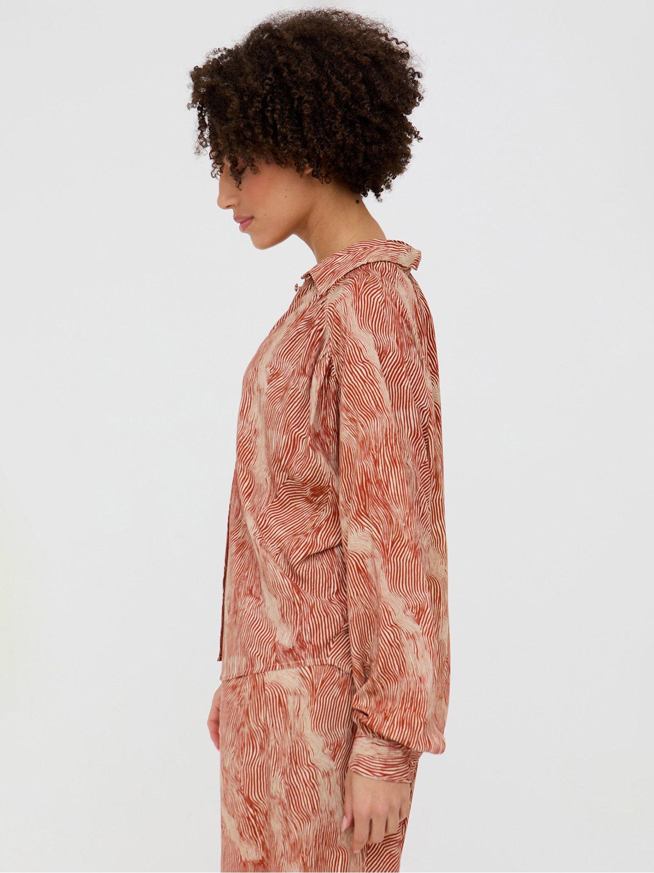  image of raffya-ginger-button-down-tiger-print-shirt-in-ginger-orange