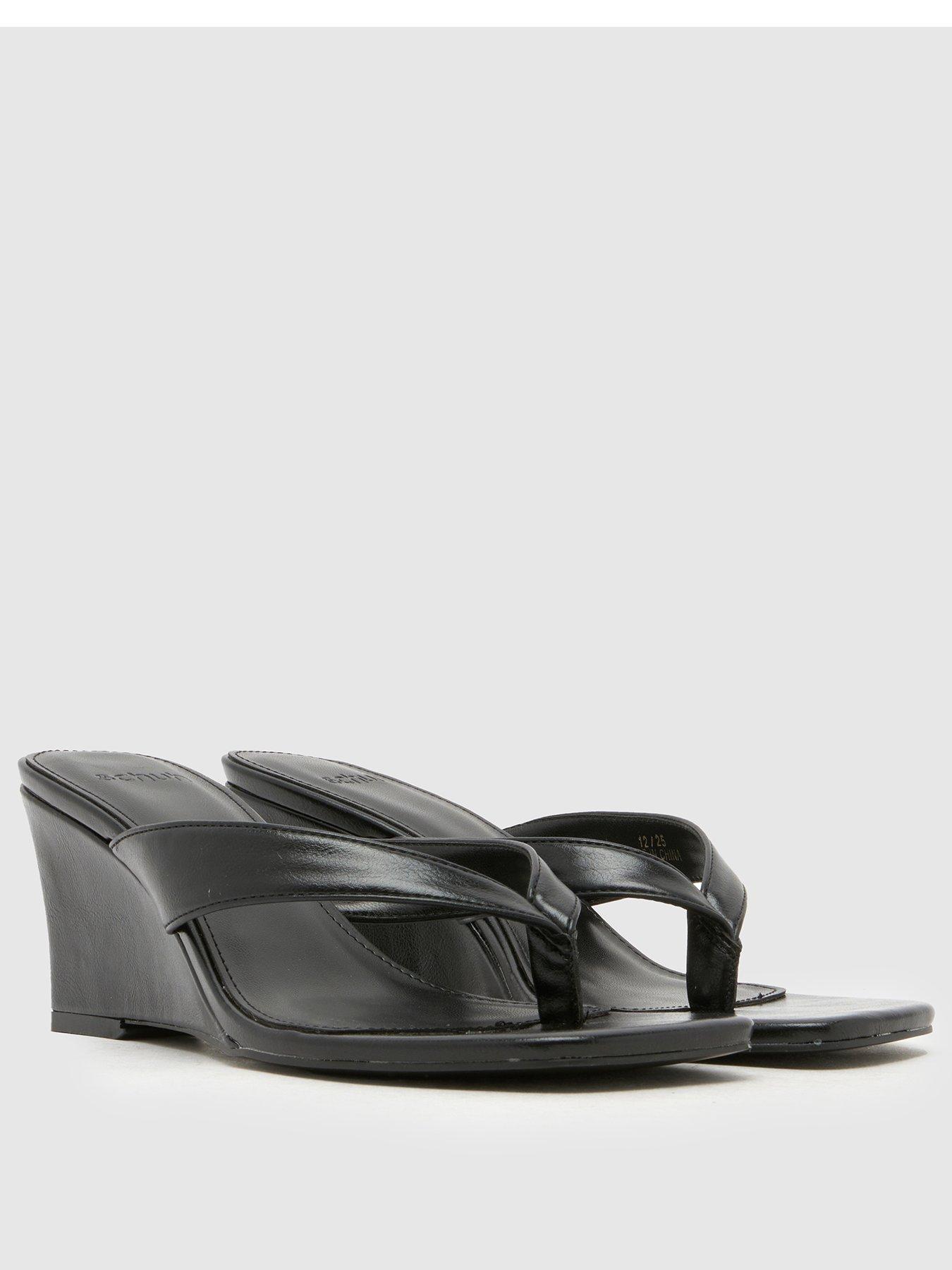  image of schuh-solomon-wedge-sandal-black