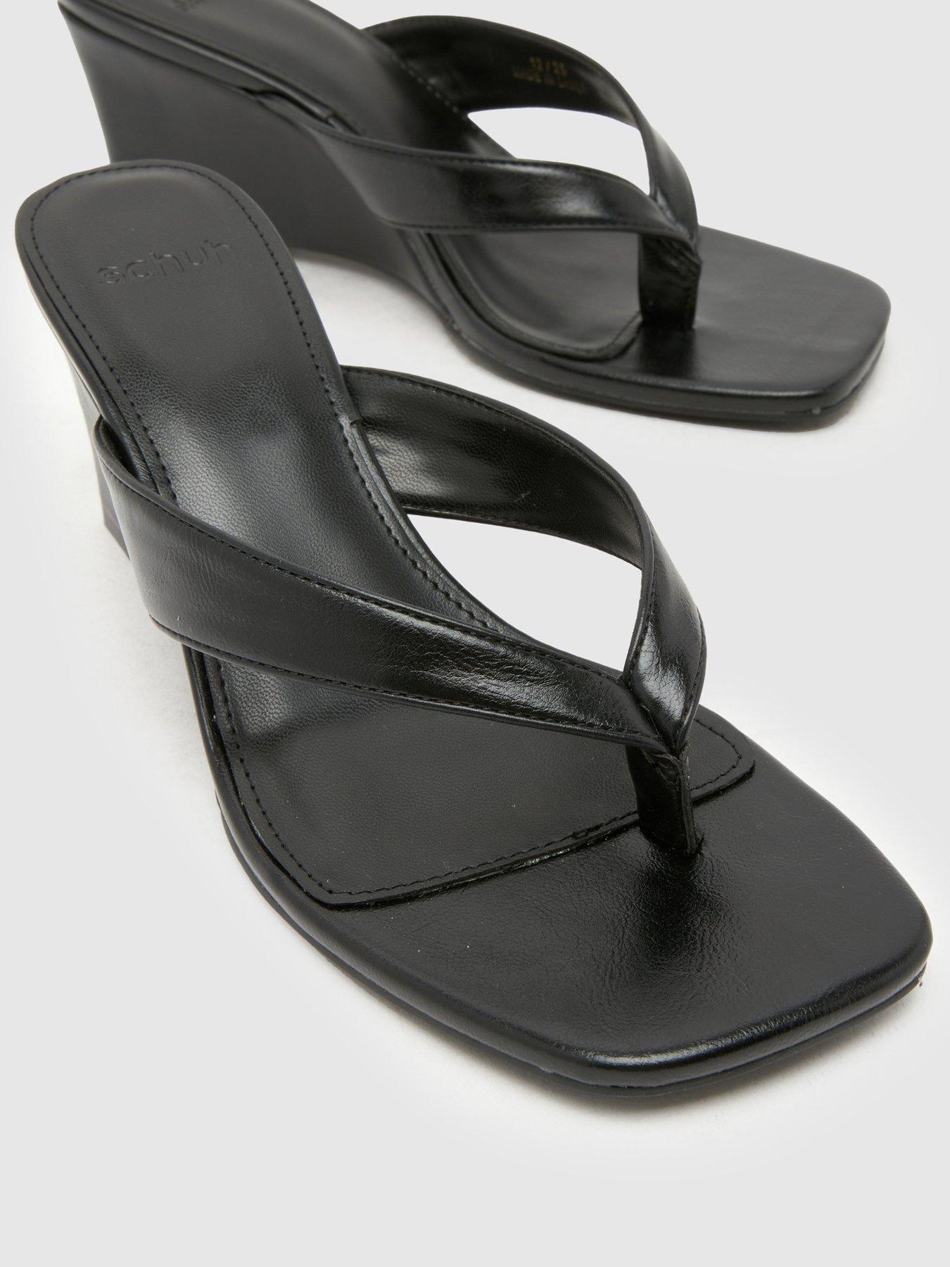  image of schuh-solomon-wedge-sandal-black