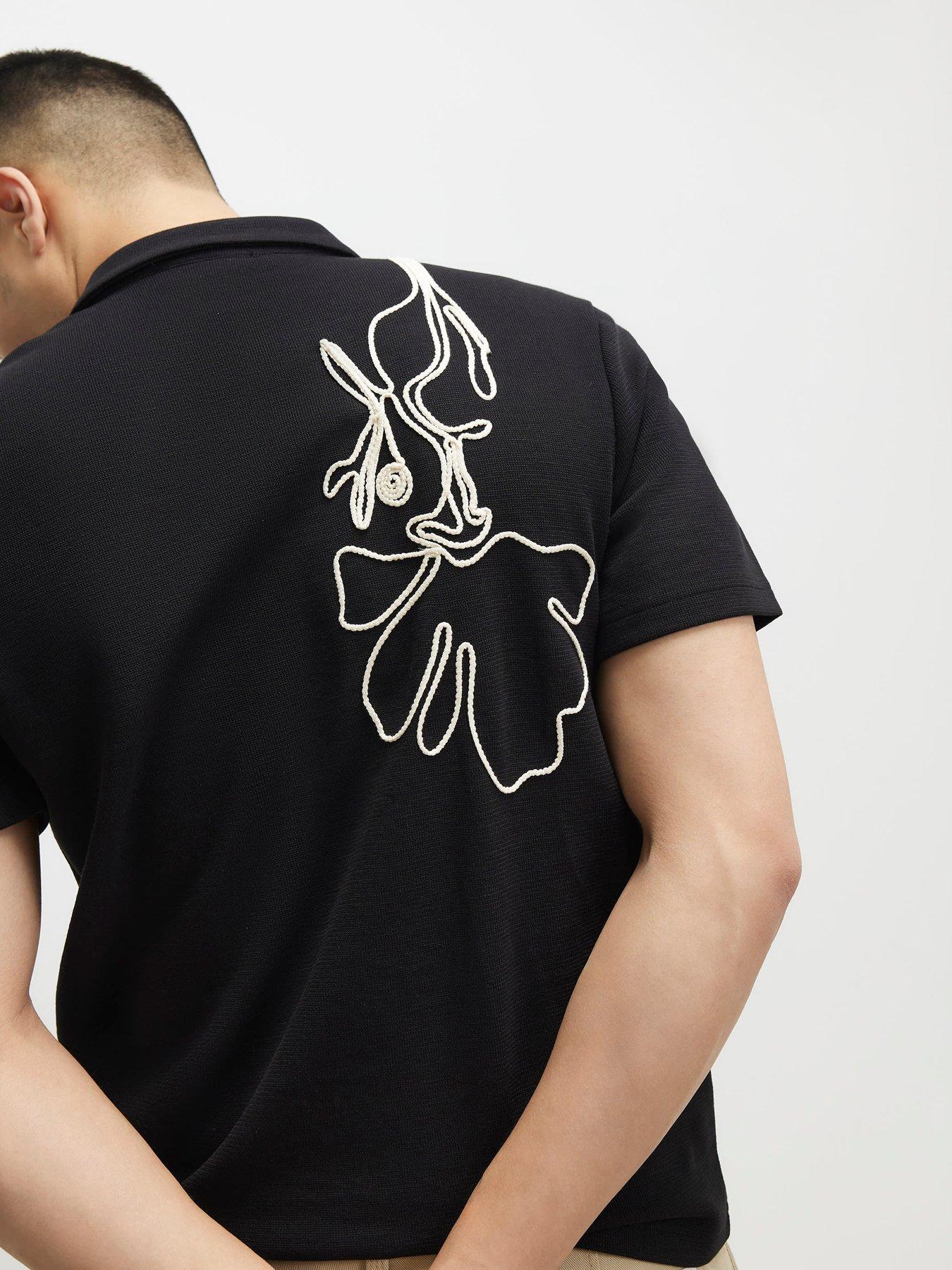 Image 2 of 6 of River Island Slim Flower Roping Polo Shirt - Black