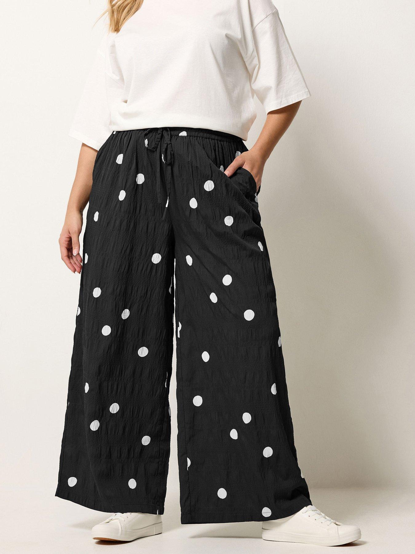 Image 1 of 5 of Yours Curve Woven Polka Dot Printed Trousers - Black