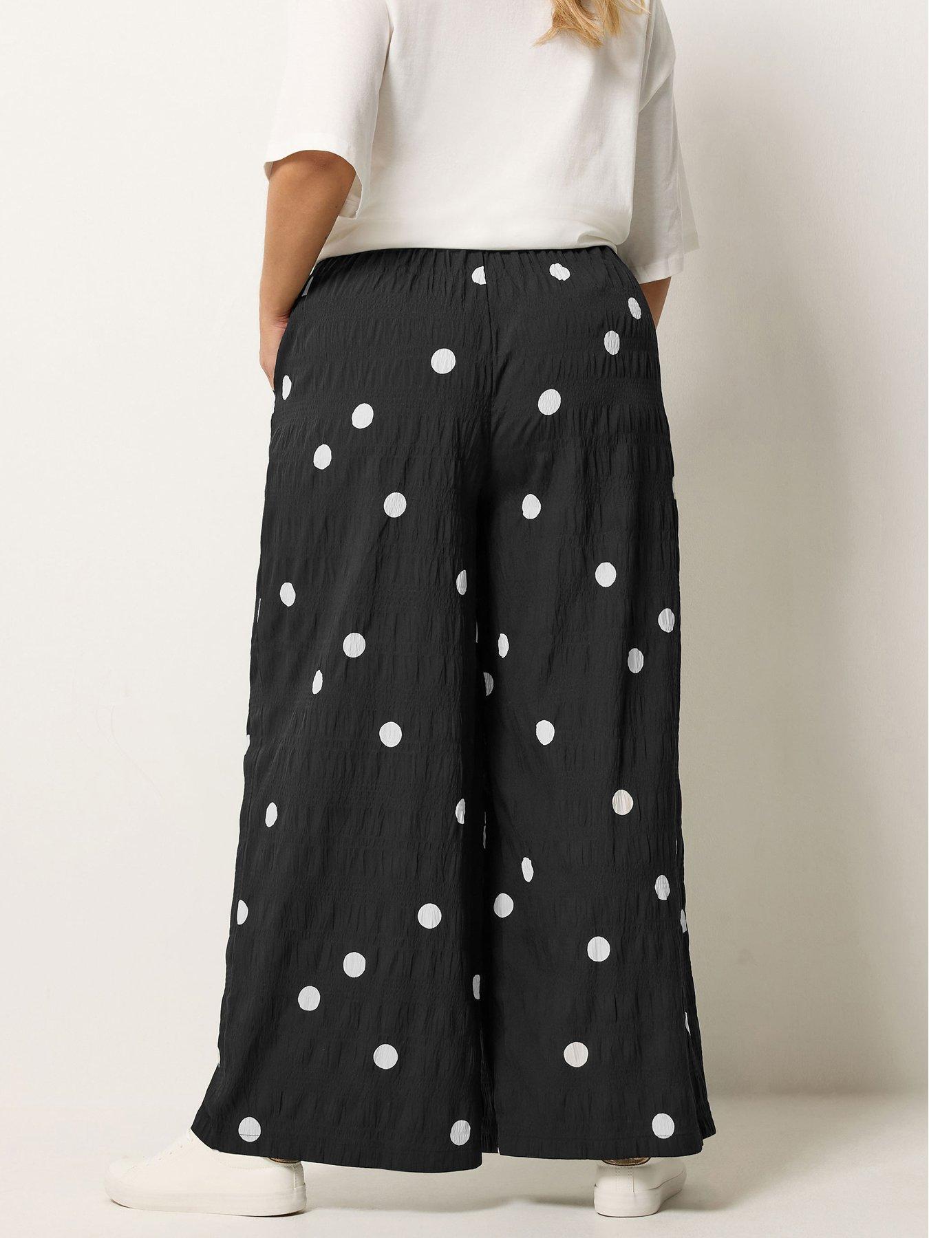 Image 2 of 5 of Yours Curve Woven Polka Dot Printed Trousers - Black