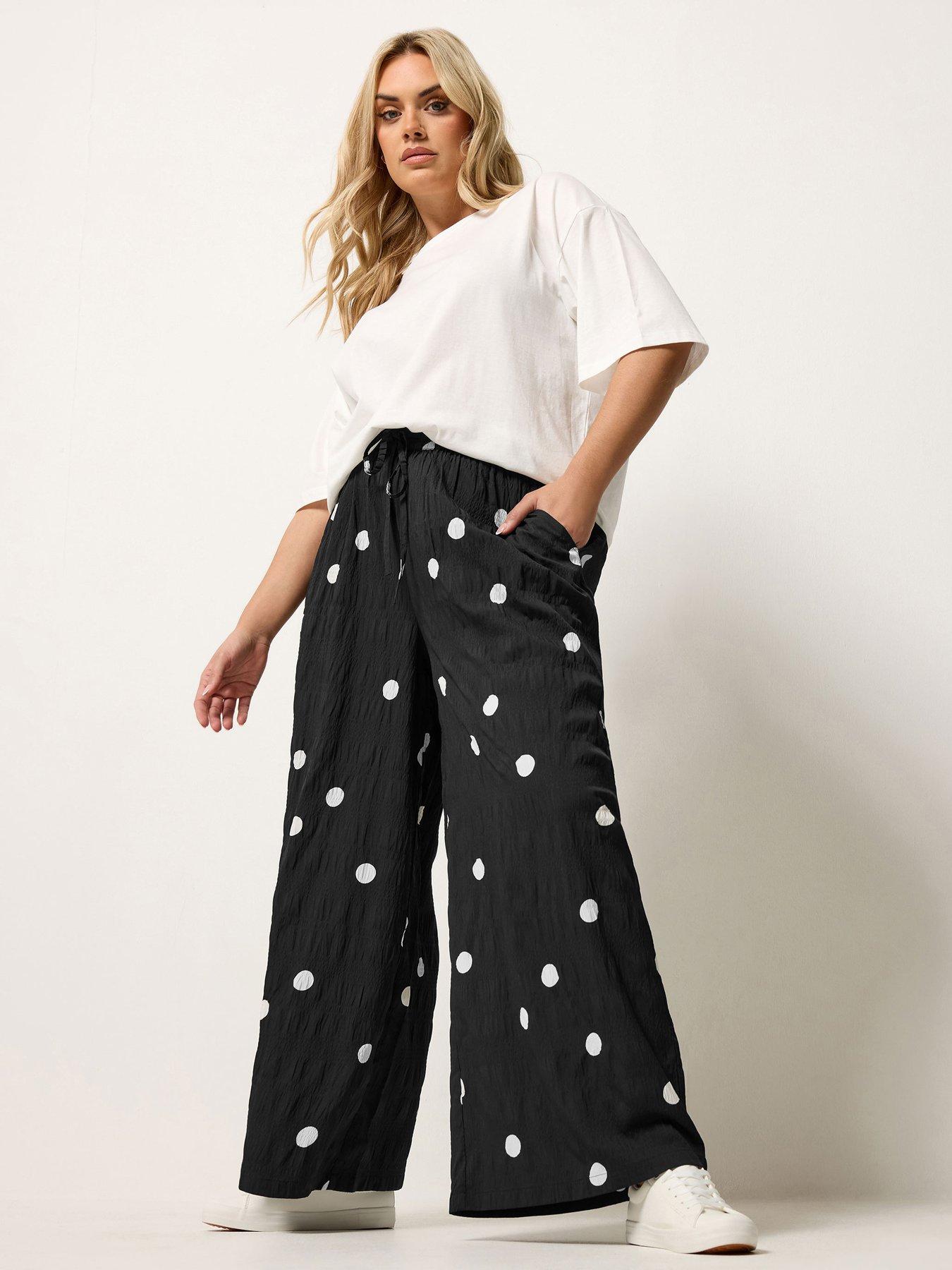 Image 3 of 5 of Yours Curve Woven Polka Dot Printed Trousers - Black