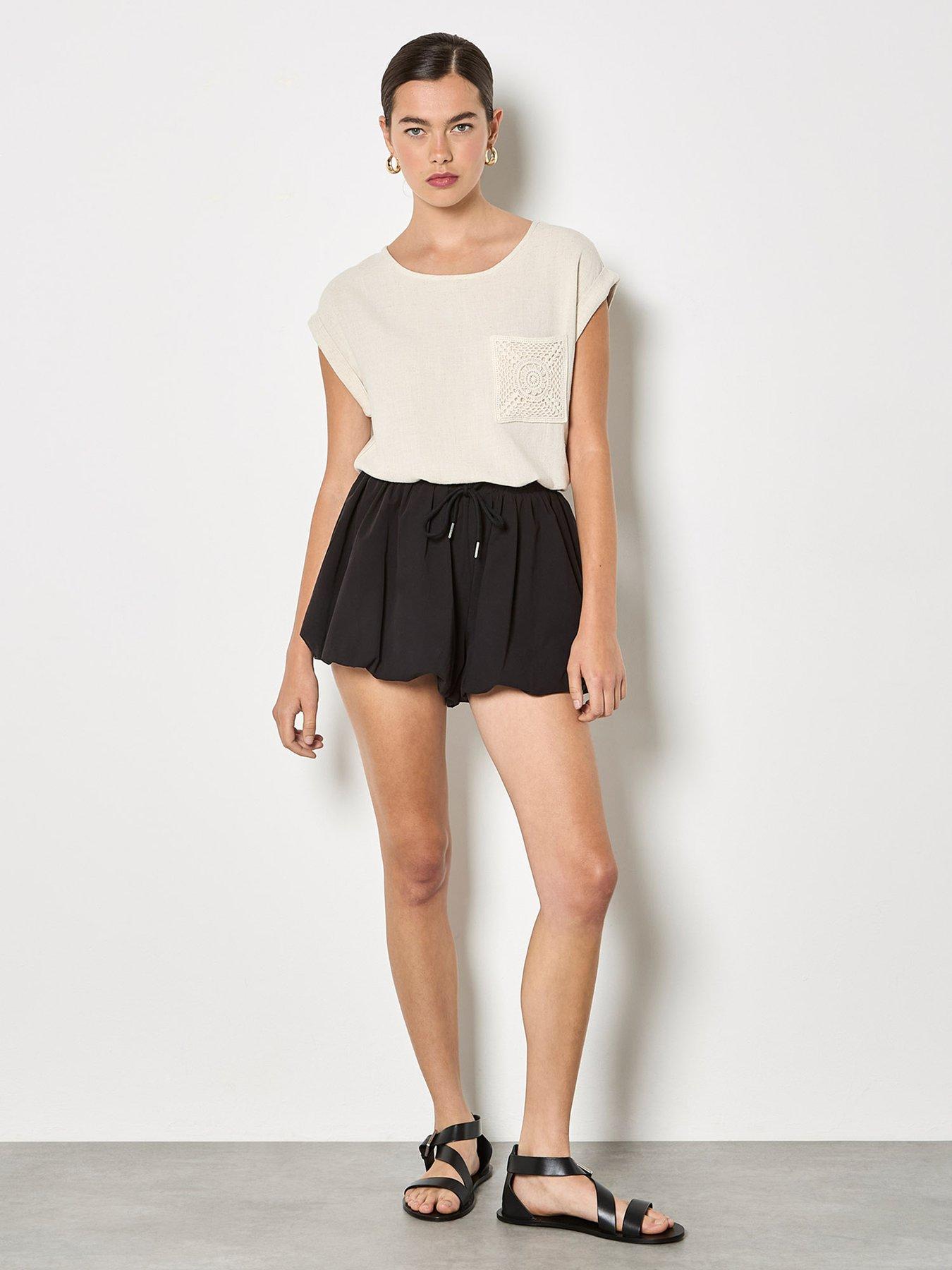  image of apricot-crochet-pocket-turn-up-tee