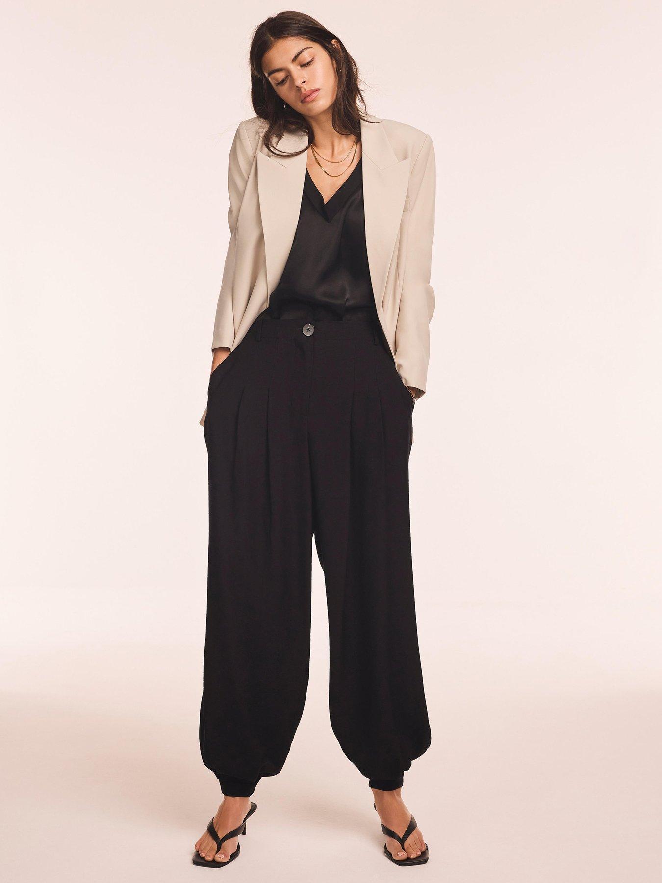 front image of mint-velvet-black-cuffed-balloon-jogger