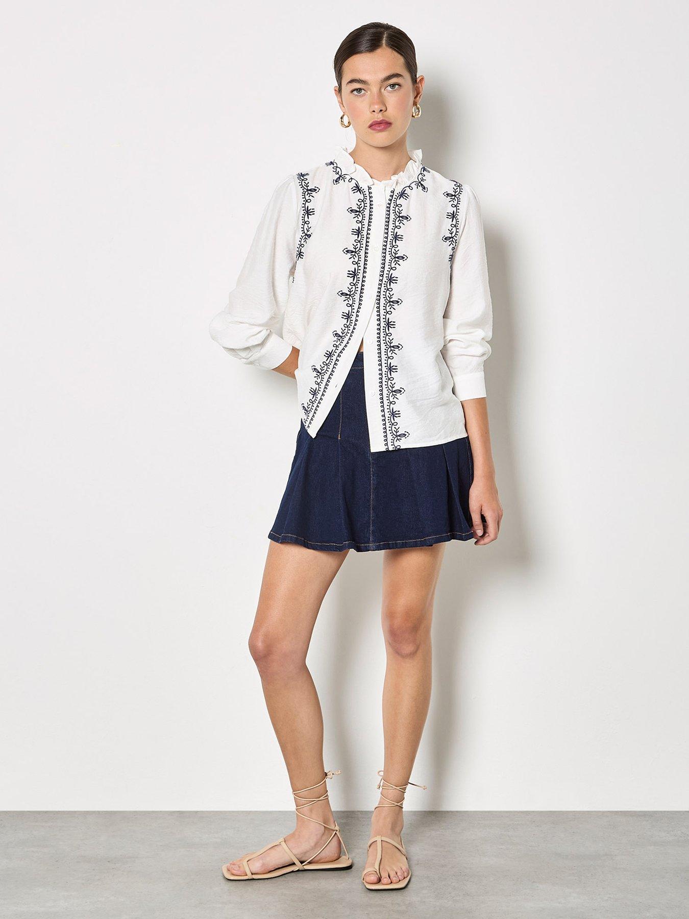  image of apricot-ruffle-neck-embroidered-blouse