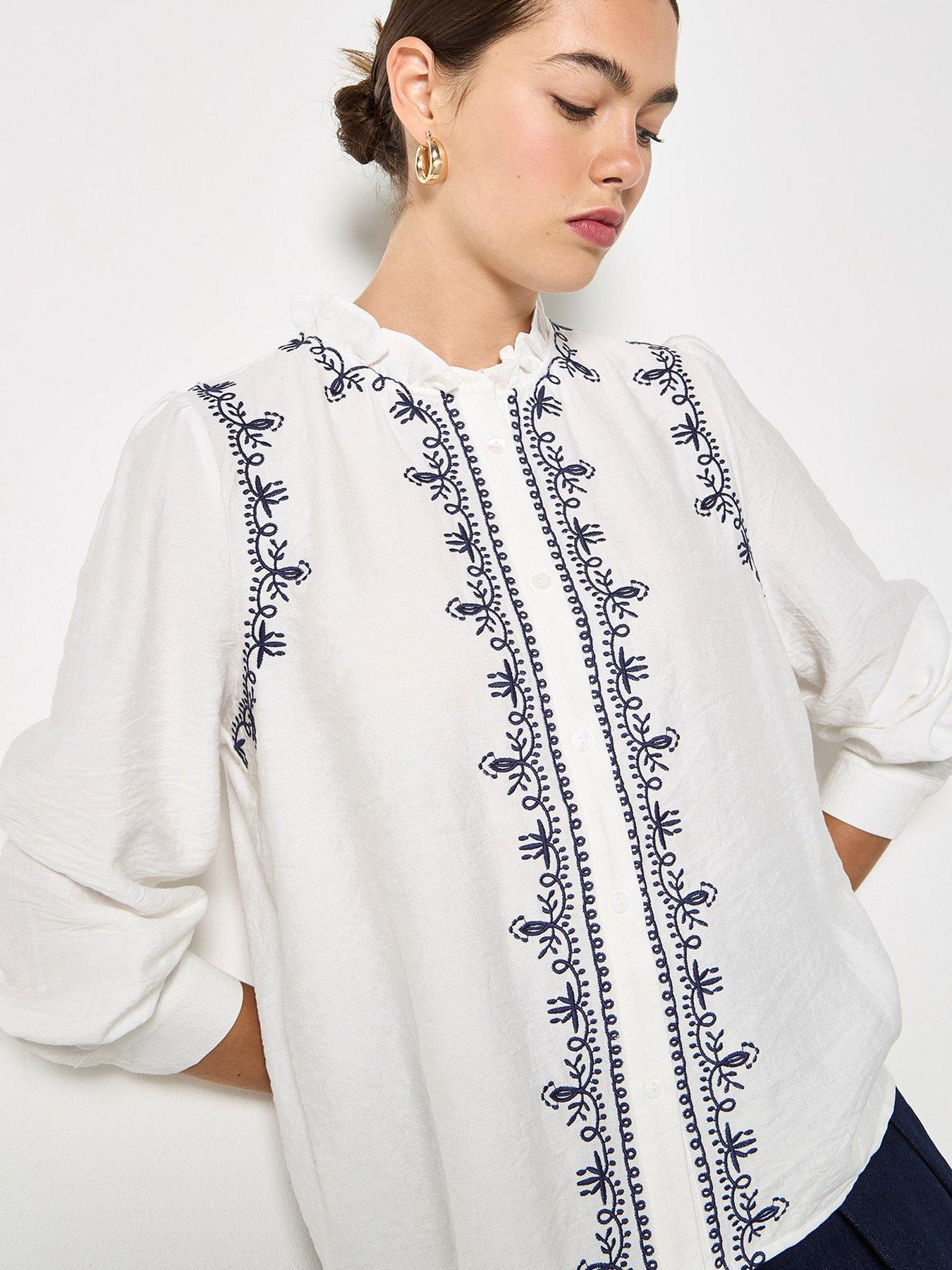  image of apricot-ruffle-neck-embroidered-blouse