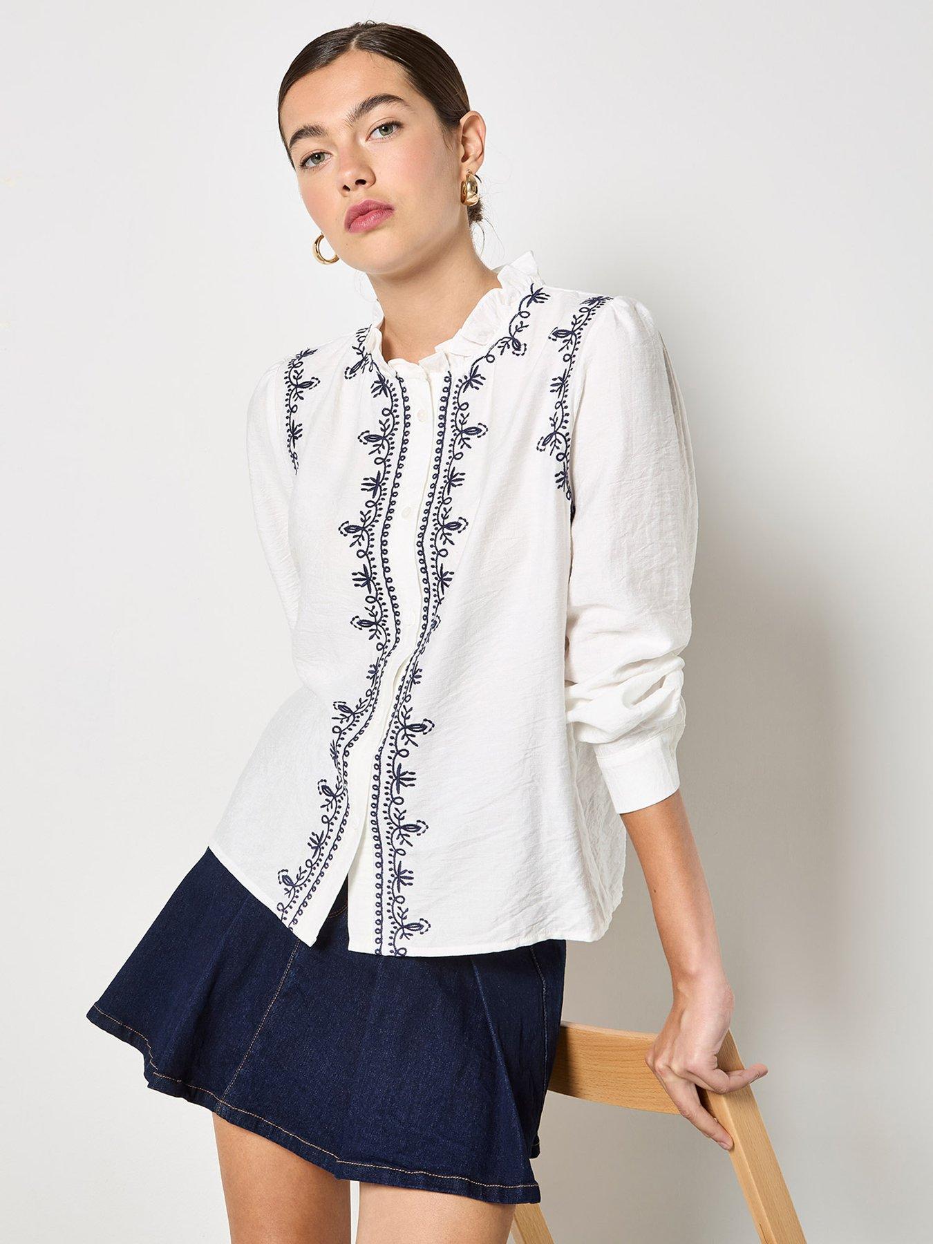  image of apricot-ruffle-neck-embroidered-blouse